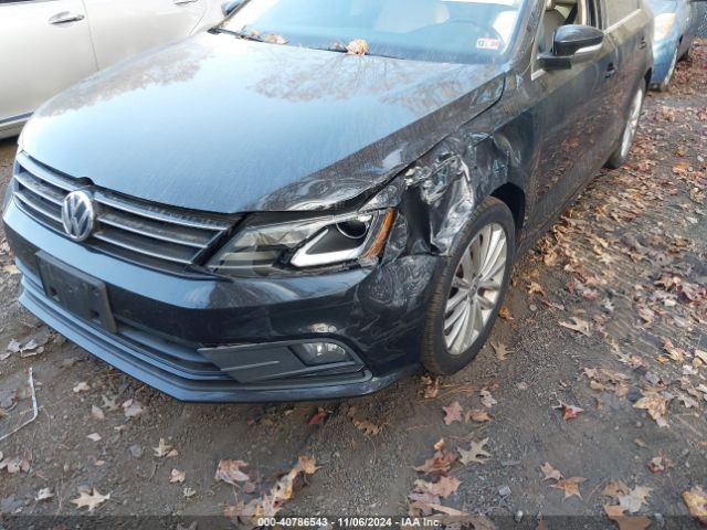 Photo 5 VIN: 3VWL17AJ4GM204203 - VOLKSWAGEN JETTA 