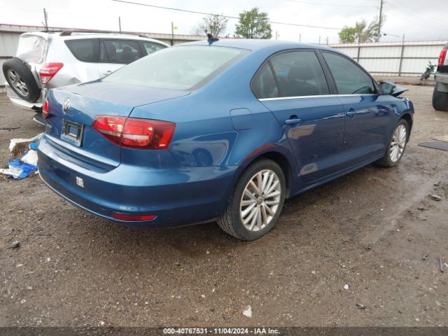 Photo 3 VIN: 3VWL17AJ9GM372385 - VOLKSWAGEN JETTA 