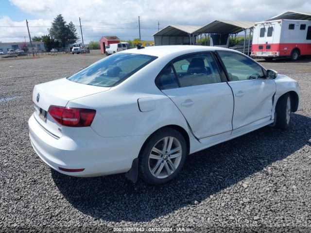 Photo 3 VIN: 3VWL17AJXHM386703 - VOLKSWAGEN JETTA 