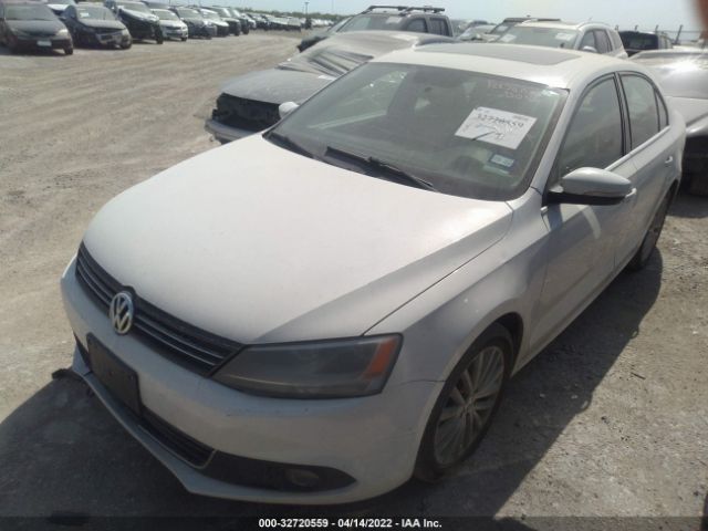 Photo 1 VIN: 3VWLX7AJ2BM360943 - VOLKSWAGEN JETTA SEDAN 