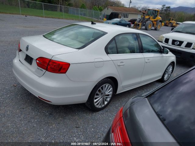 Photo 3 VIN: 3VWLX7AJ4BM005627 - VOLKSWAGEN JETTA 