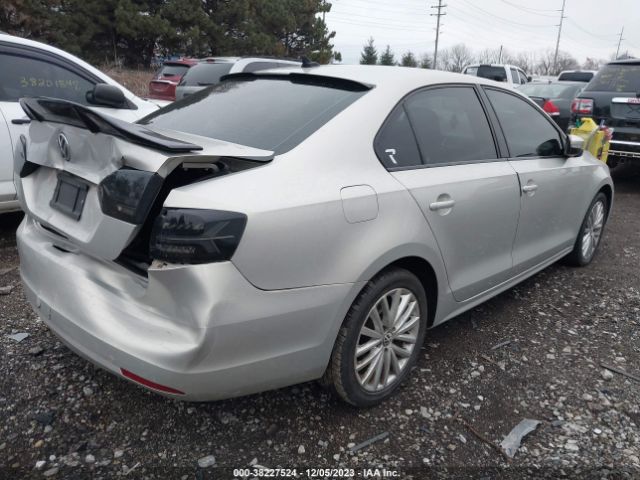 Photo 3 VIN: 3VWLX7AJ7CM306426 - VOLKSWAGEN JETTA 