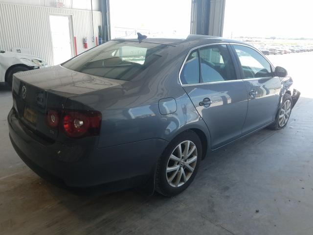 Photo 3 VIN: 3VWRX7AJ5AM030061 - VOLKSWAGEN JETTA 