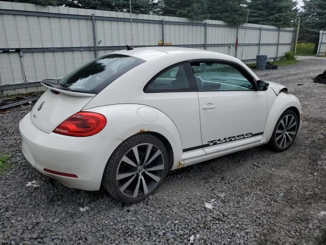 Photo 2 VIN: 3VWVA7AT6CM605210 - VOLKSWAGEN BEETLE TUR 