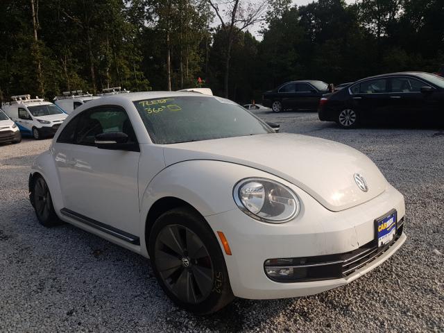 Photo 0 VIN: 3VWVA7AT8CM627063 - VOLKSWAGEN BEETLE TUR 