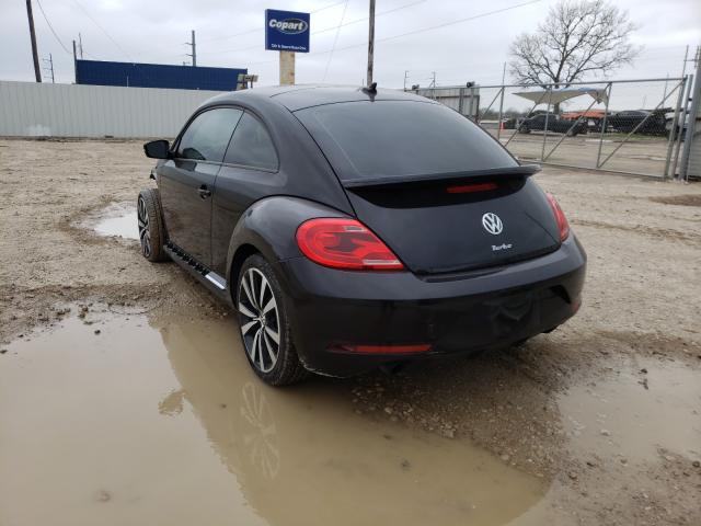 Photo 2 VIN: 3VWVS7AT7EM601067 - VOLKSWAGEN BEETLE TUR 