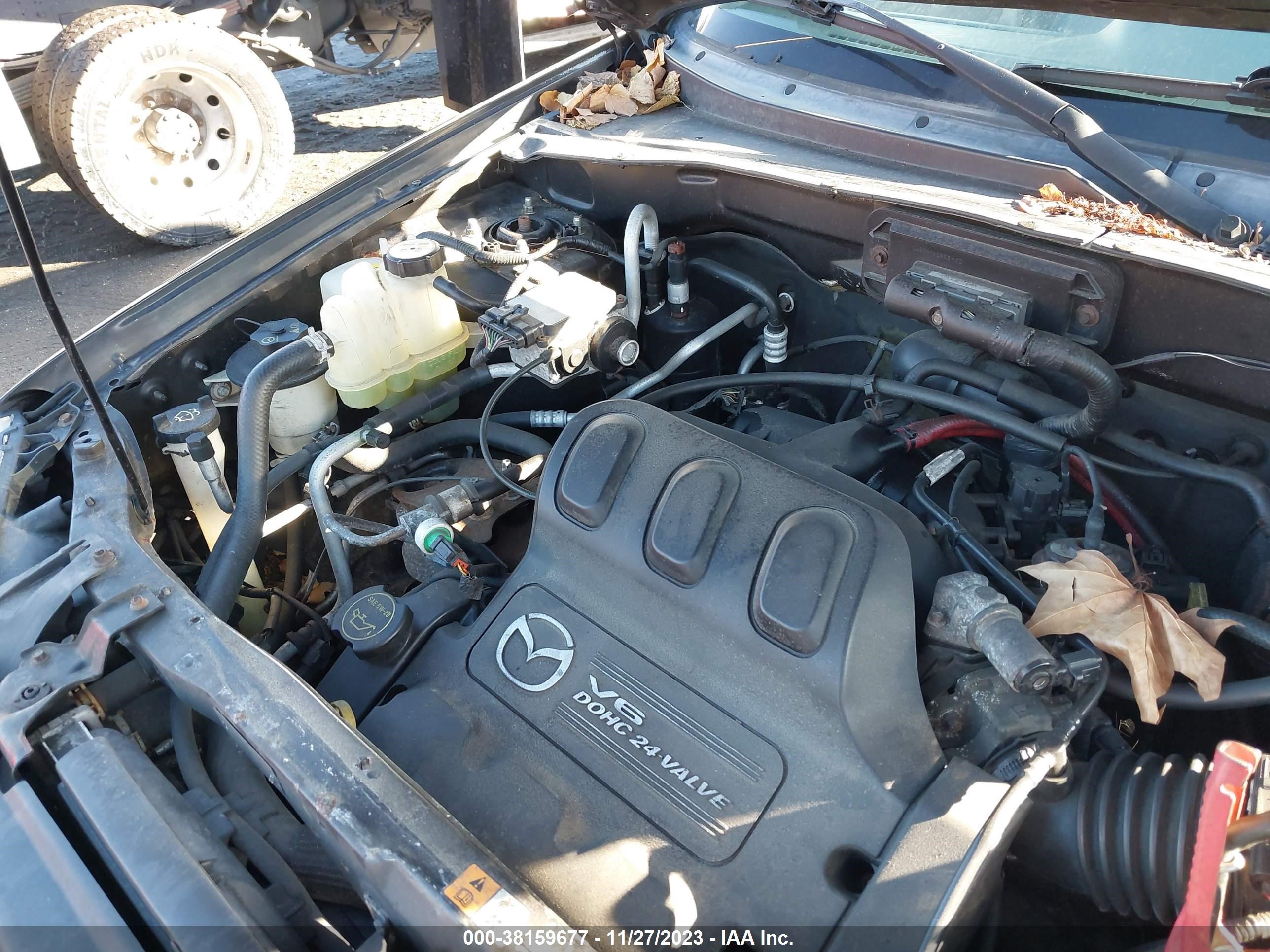 Photo 9 VIN: 4F2CU08192KM34889 - MAZDA TRIBUTE 