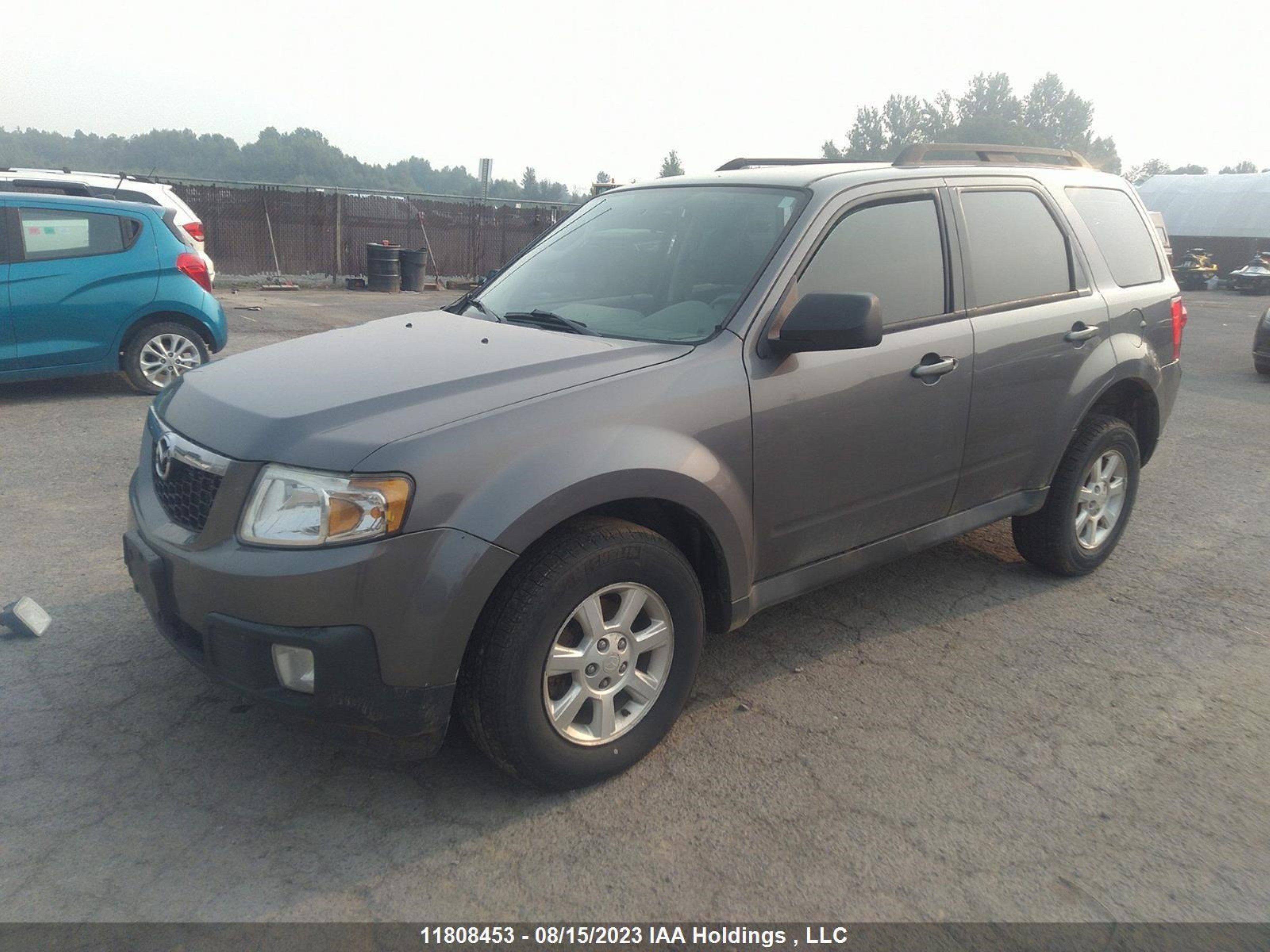 Photo 1 VIN: 4F2CY0C78BKM00362 - MAZDA TRIBUTE 