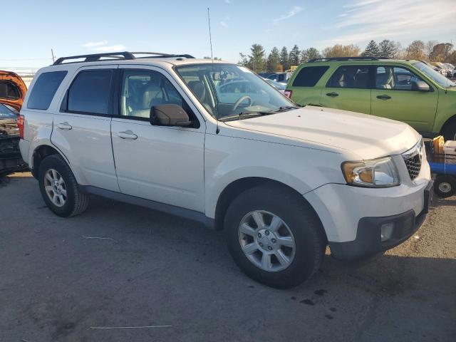 Photo 3 VIN: 4F2CY0GG3AKM03212 - MAZDA TRIBUTE 