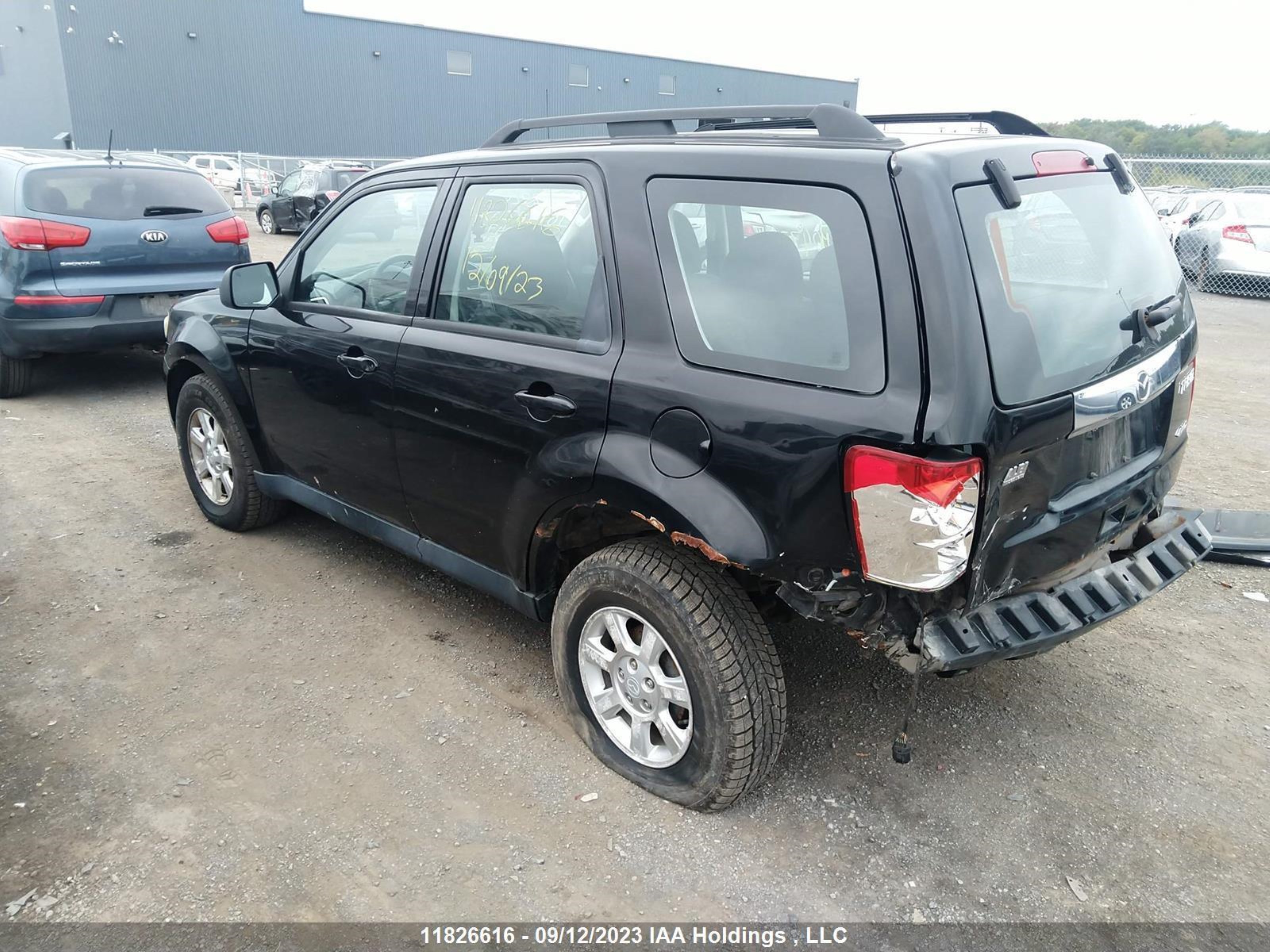 Photo 2 VIN: 4F2CY9C79AKM04777 - MAZDA TRIBUTE 