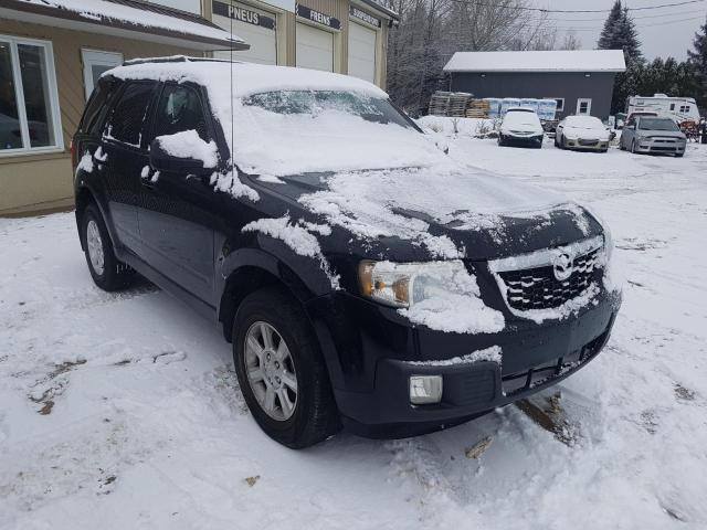 Photo 3 VIN: 4F2CY9GG7AKM00799 - MAZDA TRIBUTE 