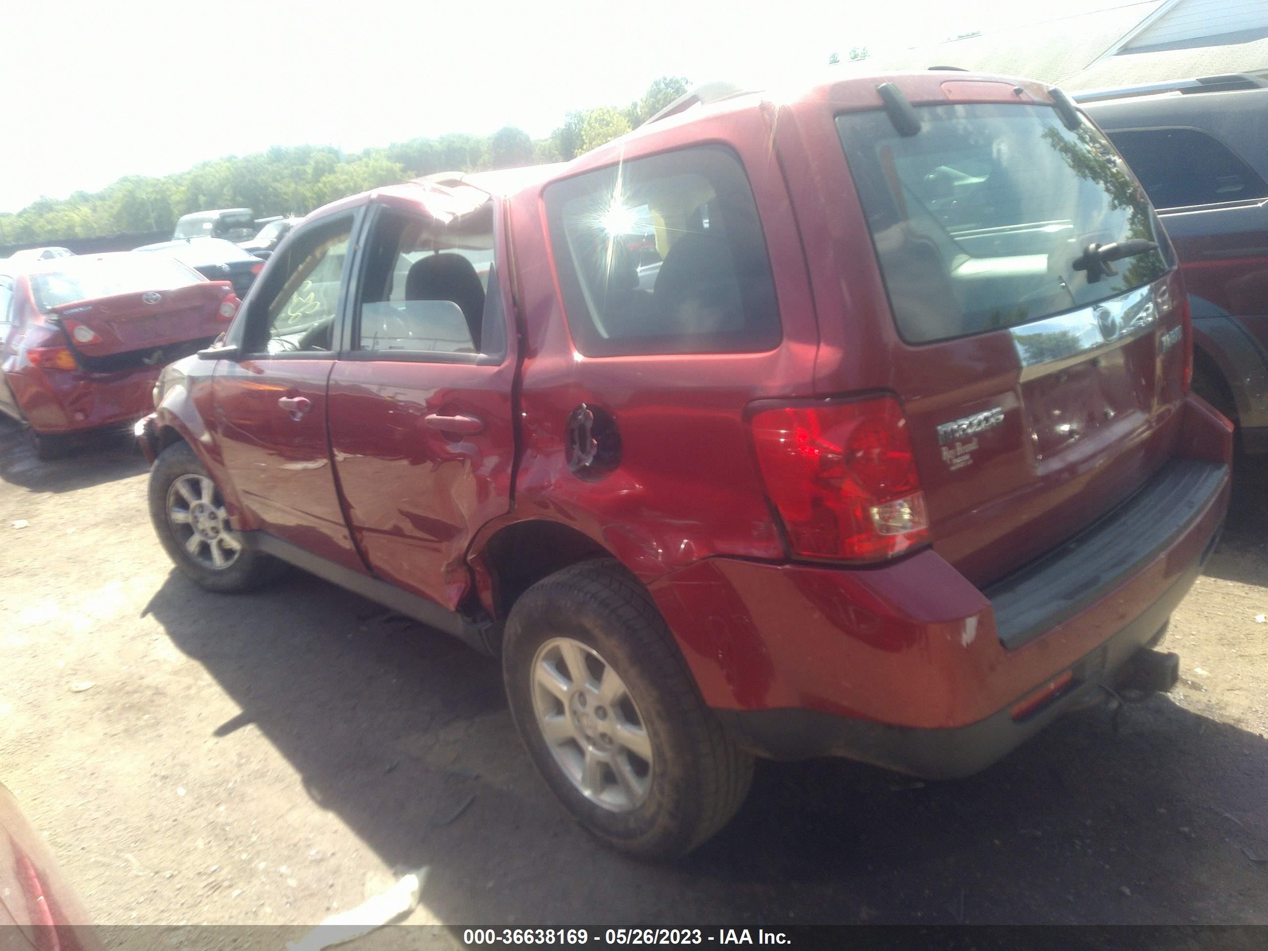 Photo 2 VIN: 4F2CZ02729KM00785 - MAZDA TRIBUTE 