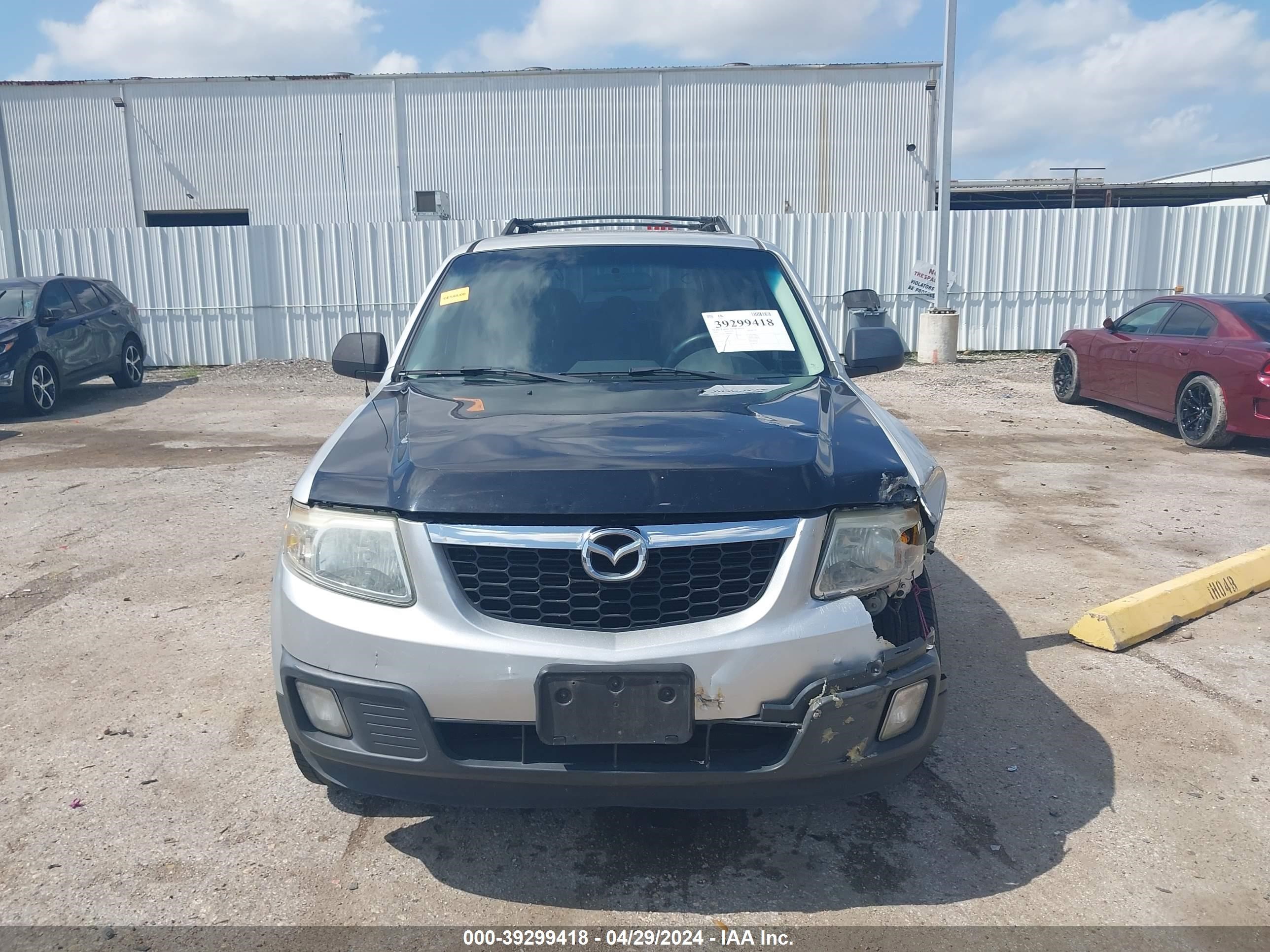 Photo 11 VIN: 4F2CZ02749KM01047 - MAZDA TRIBUTE 