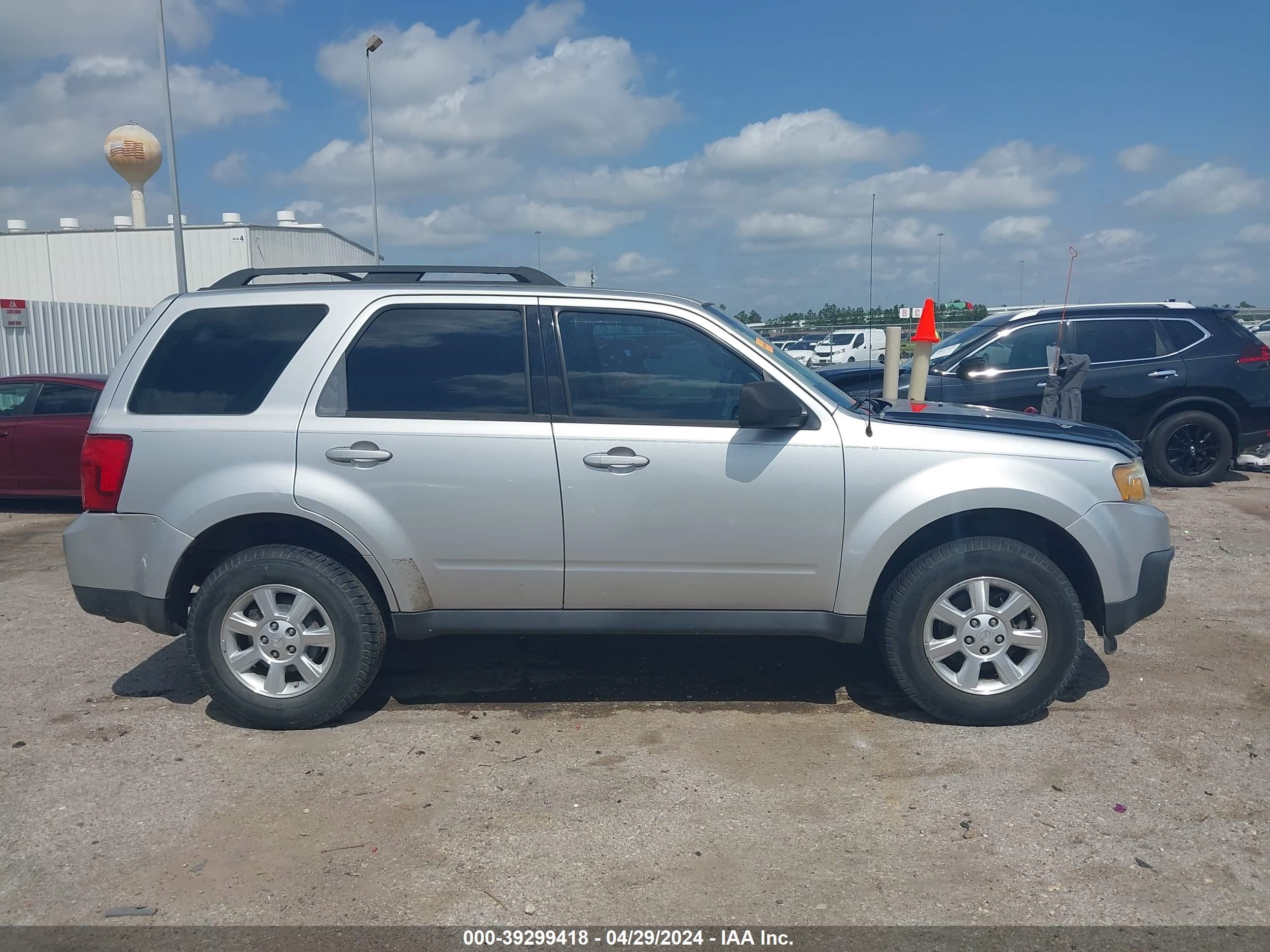 Photo 12 VIN: 4F2CZ02749KM01047 - MAZDA TRIBUTE 