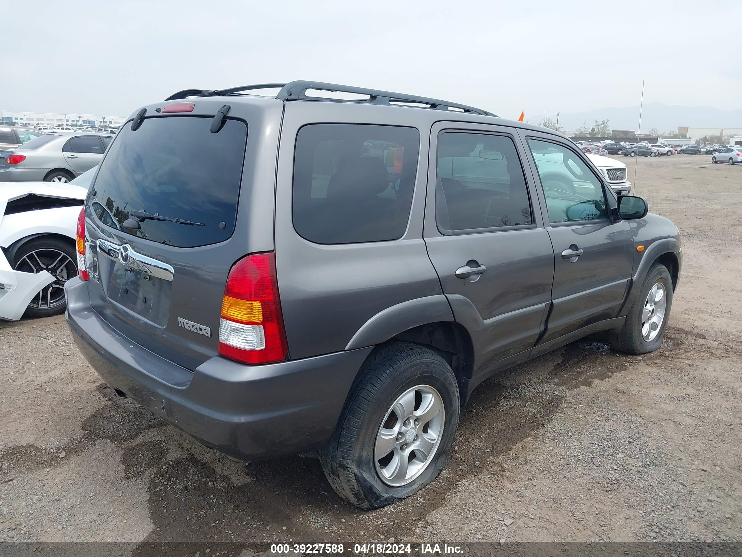 Photo 3 VIN: 4F2CZ06113KM34830 - MAZDA TRIBUTE 