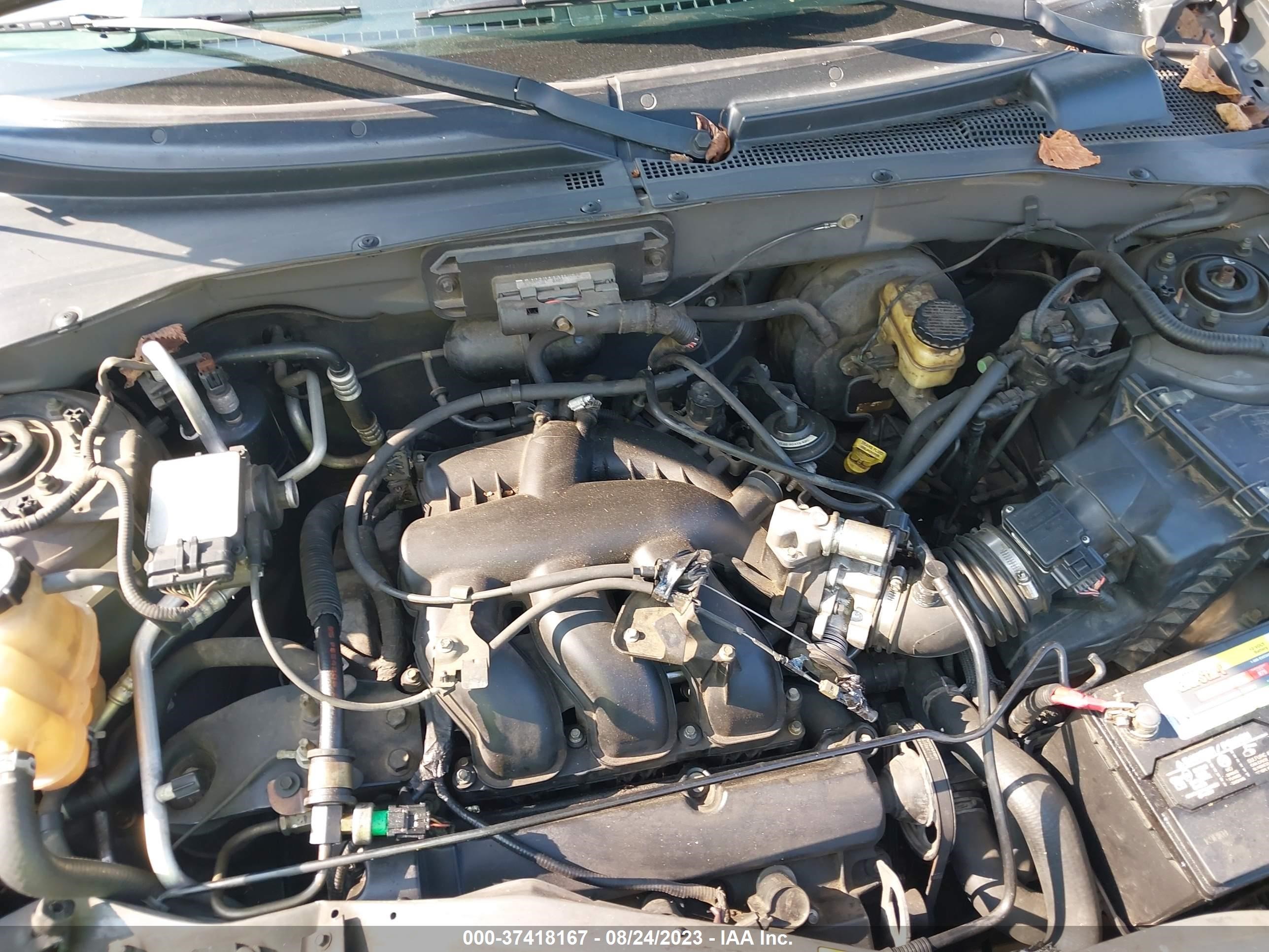 Photo 9 VIN: 4F2CZ06184KM20506 - MAZDA TRIBUTE 