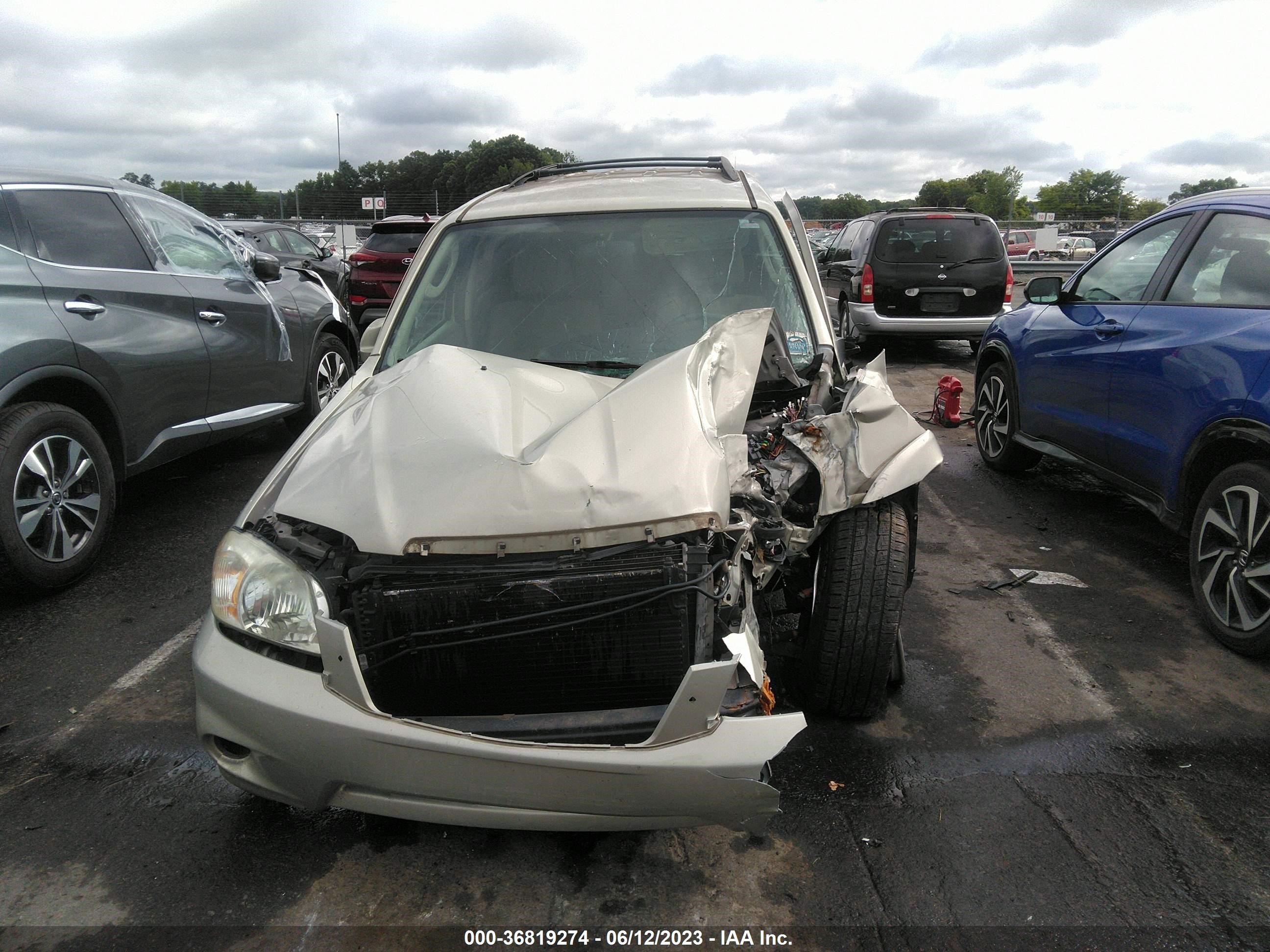 Photo 11 VIN: 4F2CZ94135KM40705 - MAZDA TRIBUTE 