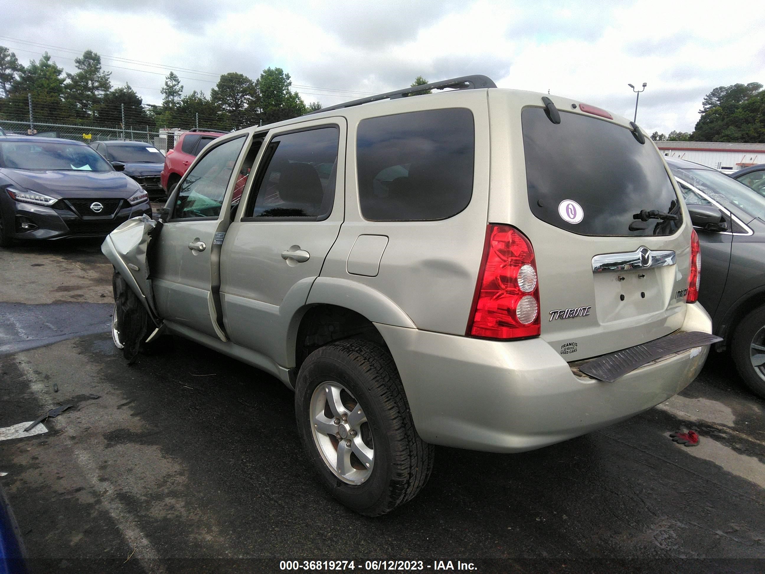 Photo 2 VIN: 4F2CZ94135KM40705 - MAZDA TRIBUTE 