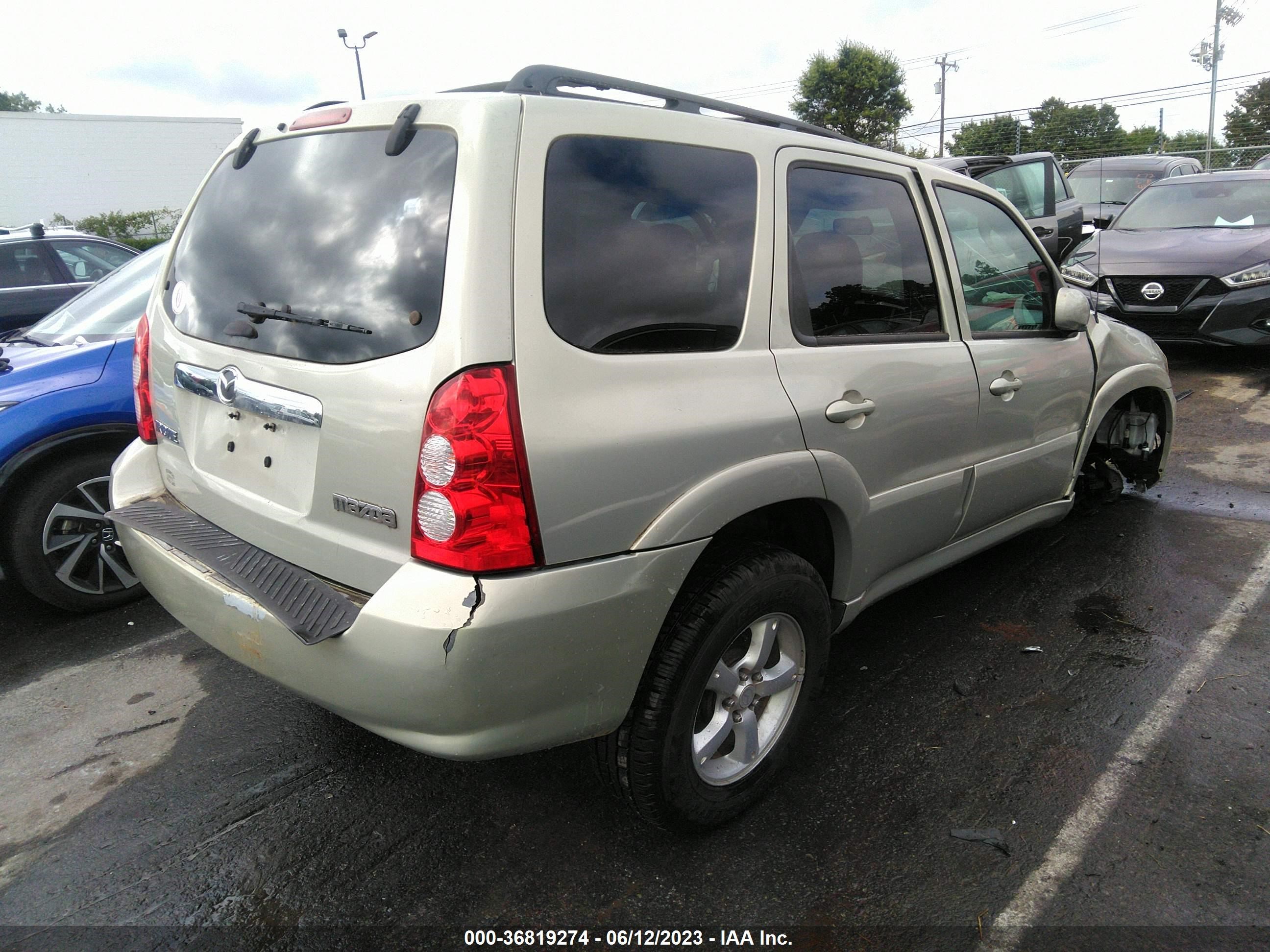 Photo 3 VIN: 4F2CZ94135KM40705 - MAZDA TRIBUTE 