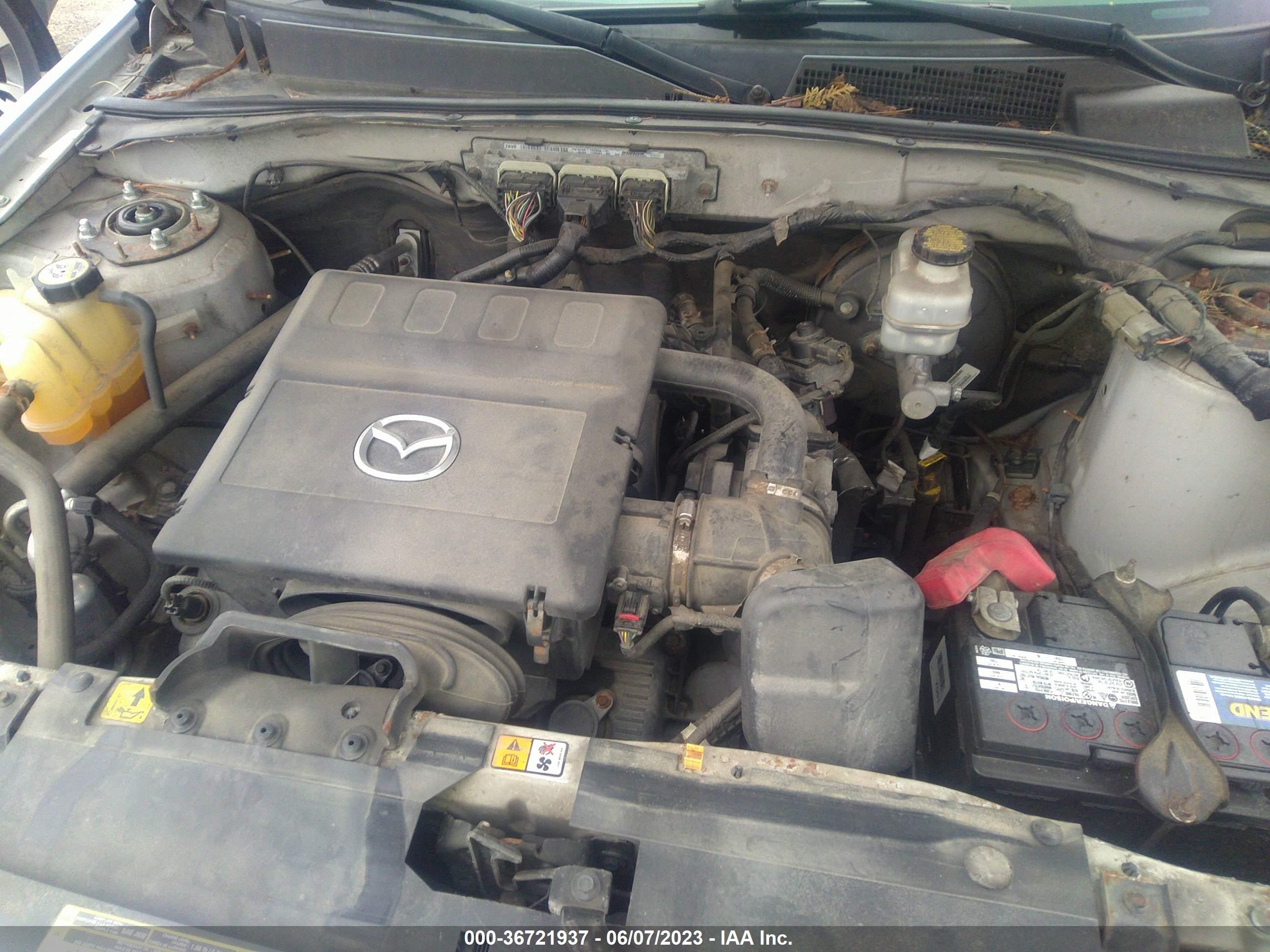 Photo 9 VIN: 4F2CZ96G39KM03922 - MAZDA TRIBUTE 