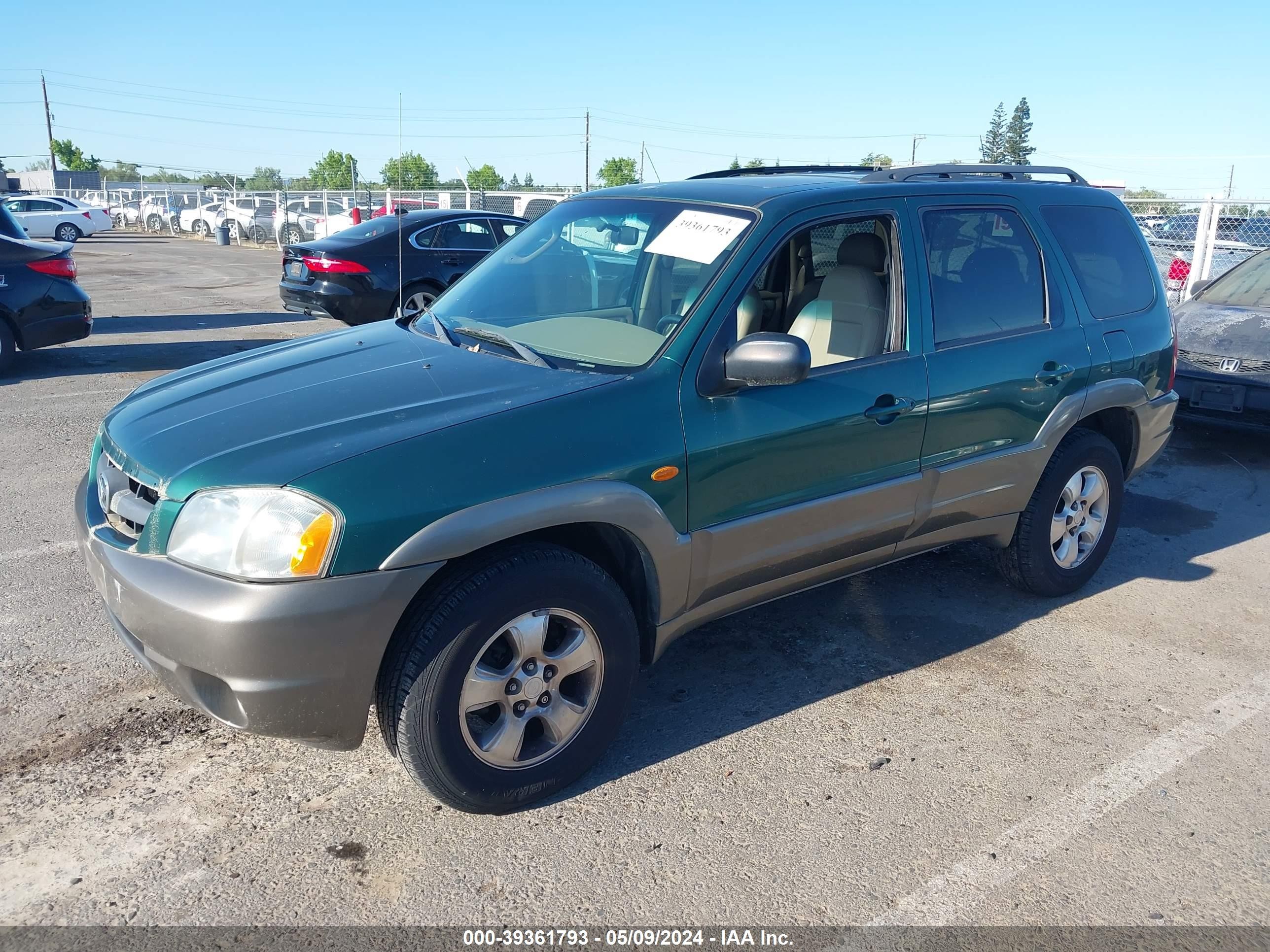 Photo 1 VIN: 4F2YU091X1KM58668 - MAZDA TRIBUTE 