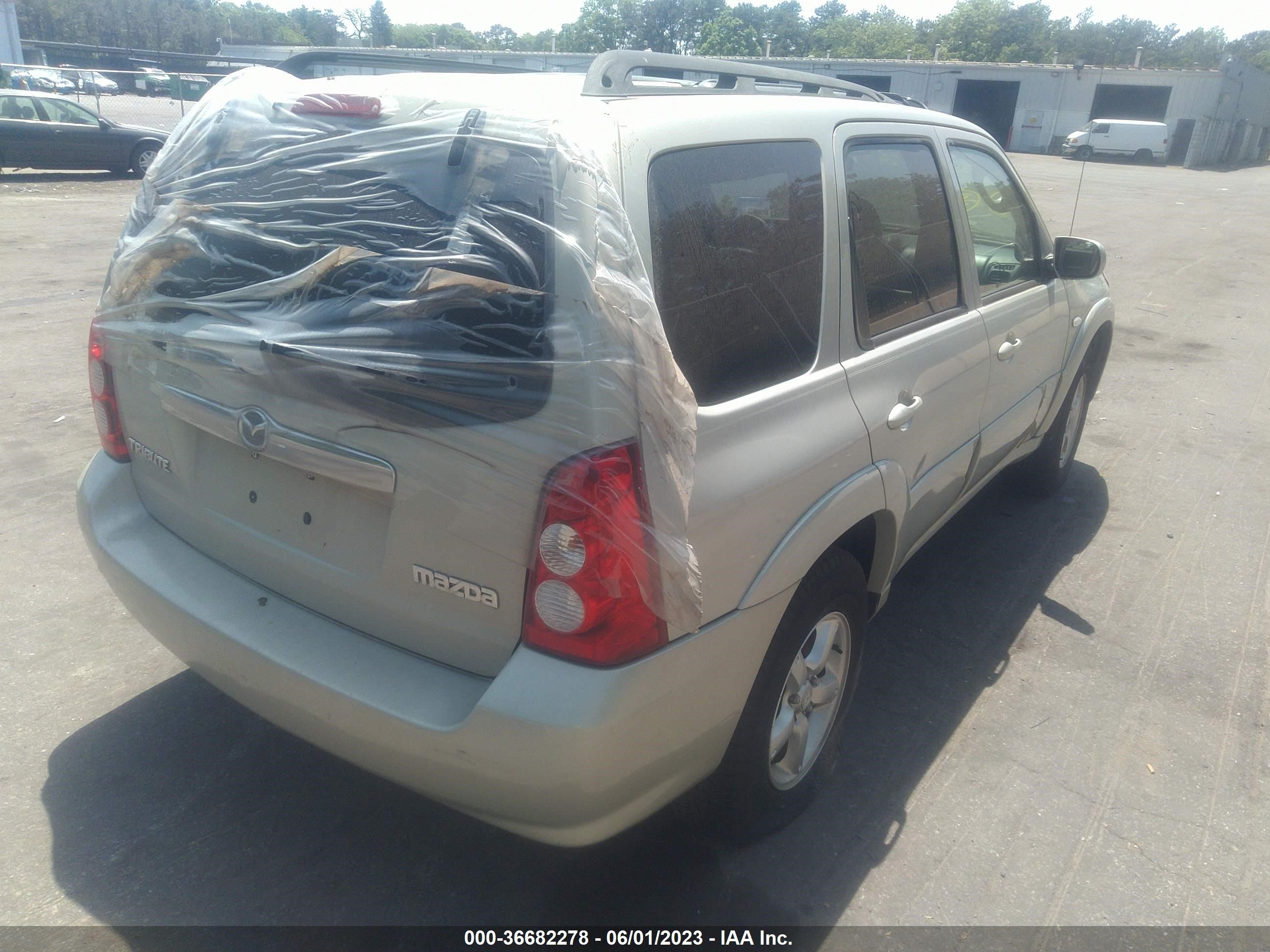 Photo 3 VIN: 4F2YZ96105KM27011 - MAZDA TRIBUTE 