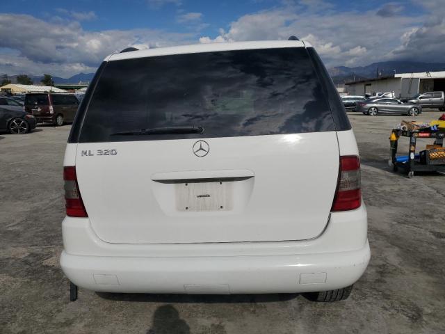 Photo 5 VIN: 4JGAB54E1YA160780 - MERCEDES-BENZ M-CLASS 