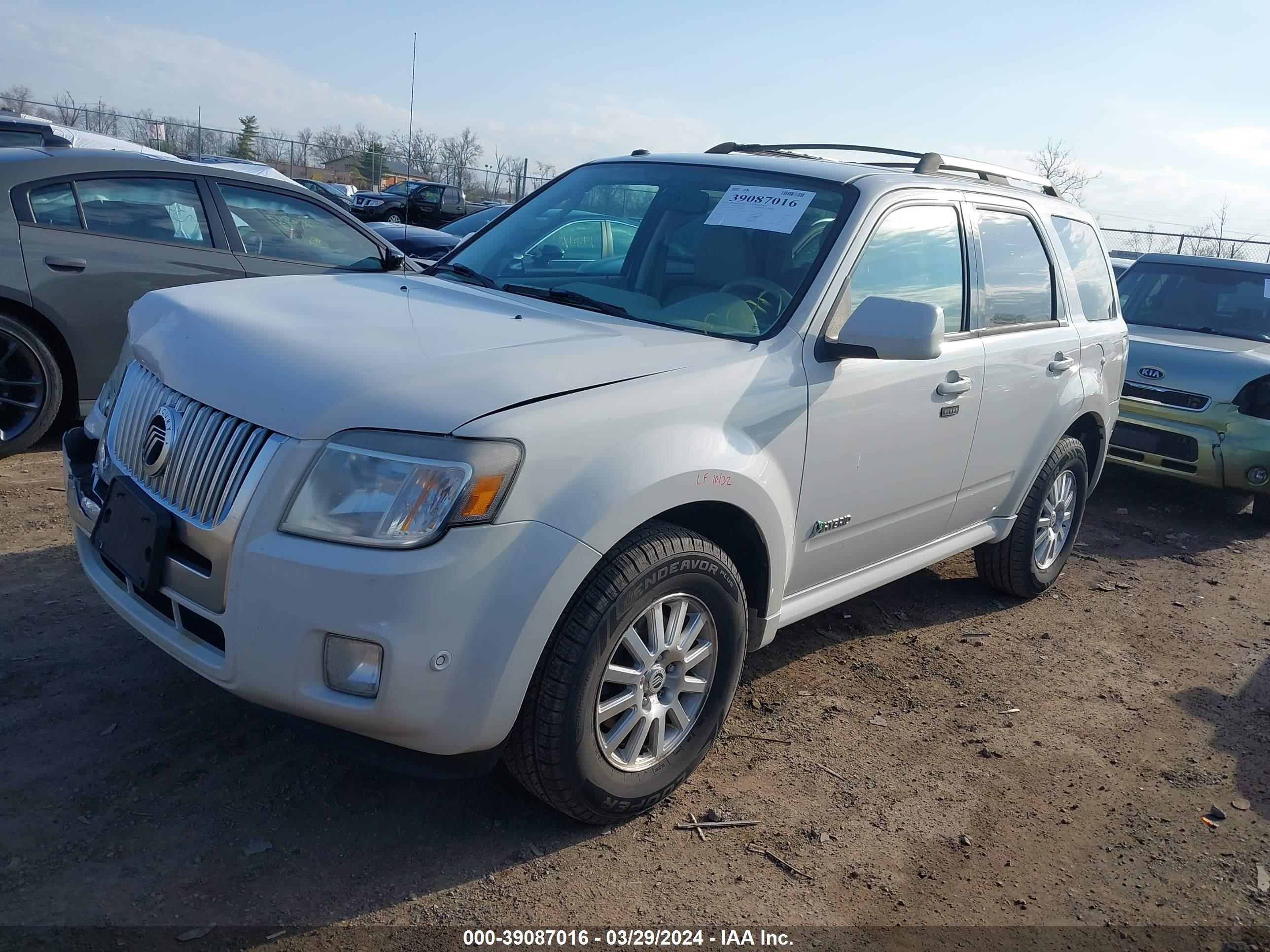 Photo 1 VIN: 4M2CN2K34AKJ10356 - MERCURY MARINER 