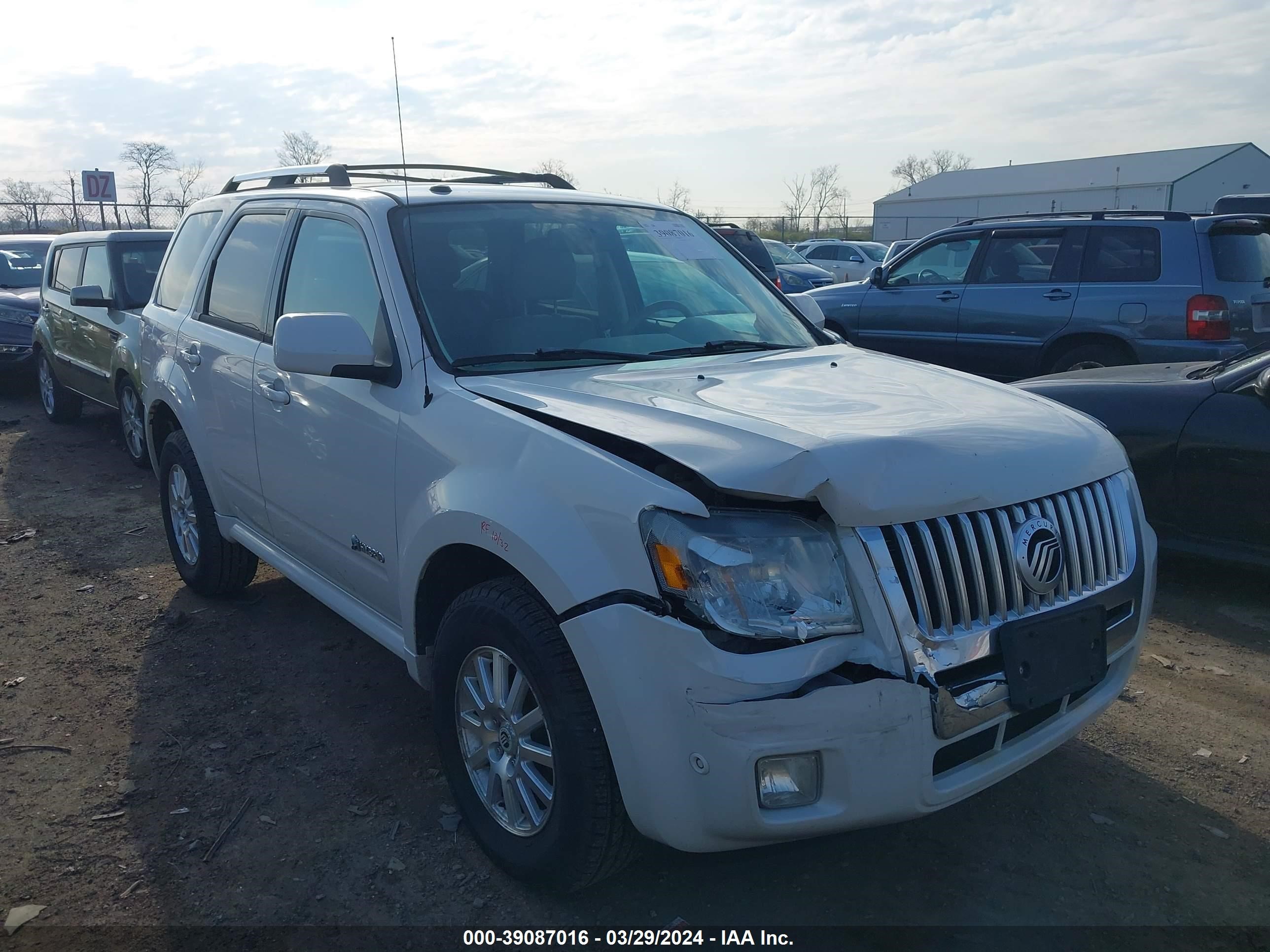 Photo 5 VIN: 4M2CN2K34AKJ10356 - MERCURY MARINER 