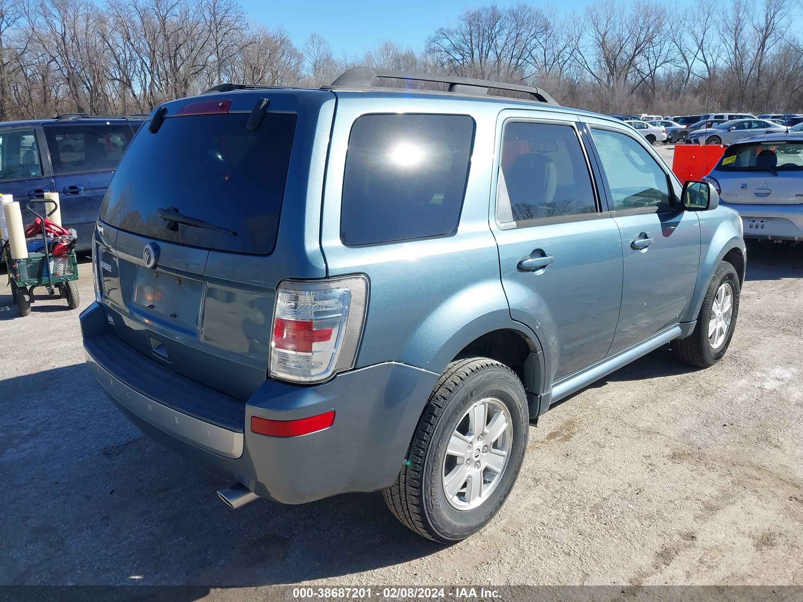 Photo 3 VIN: 4M2CN8B71AKJ13219 - MERCURY MARINER 