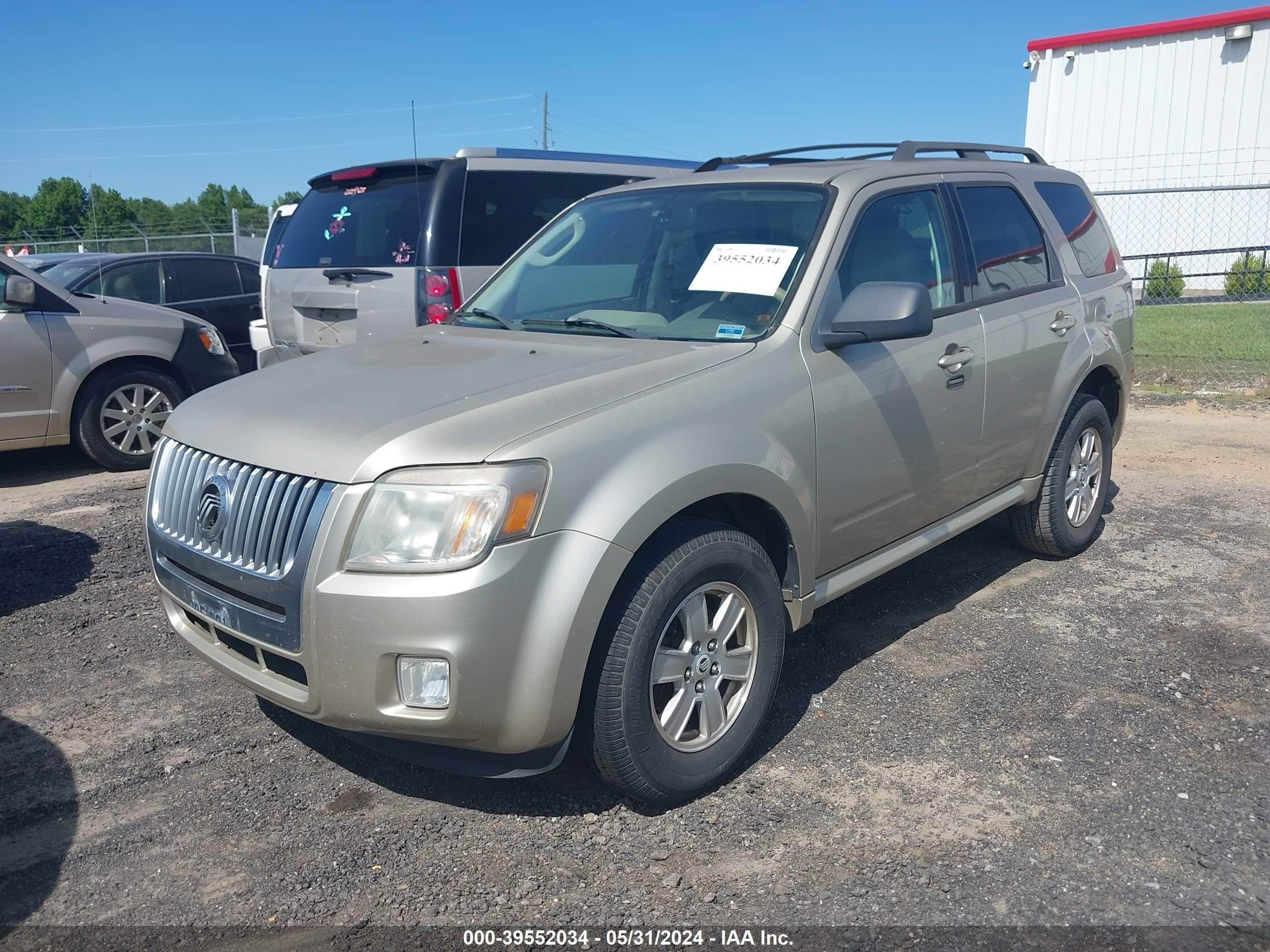 Photo 1 VIN: 4M2CN8B75AKJ03941 - MERCURY MARINER 