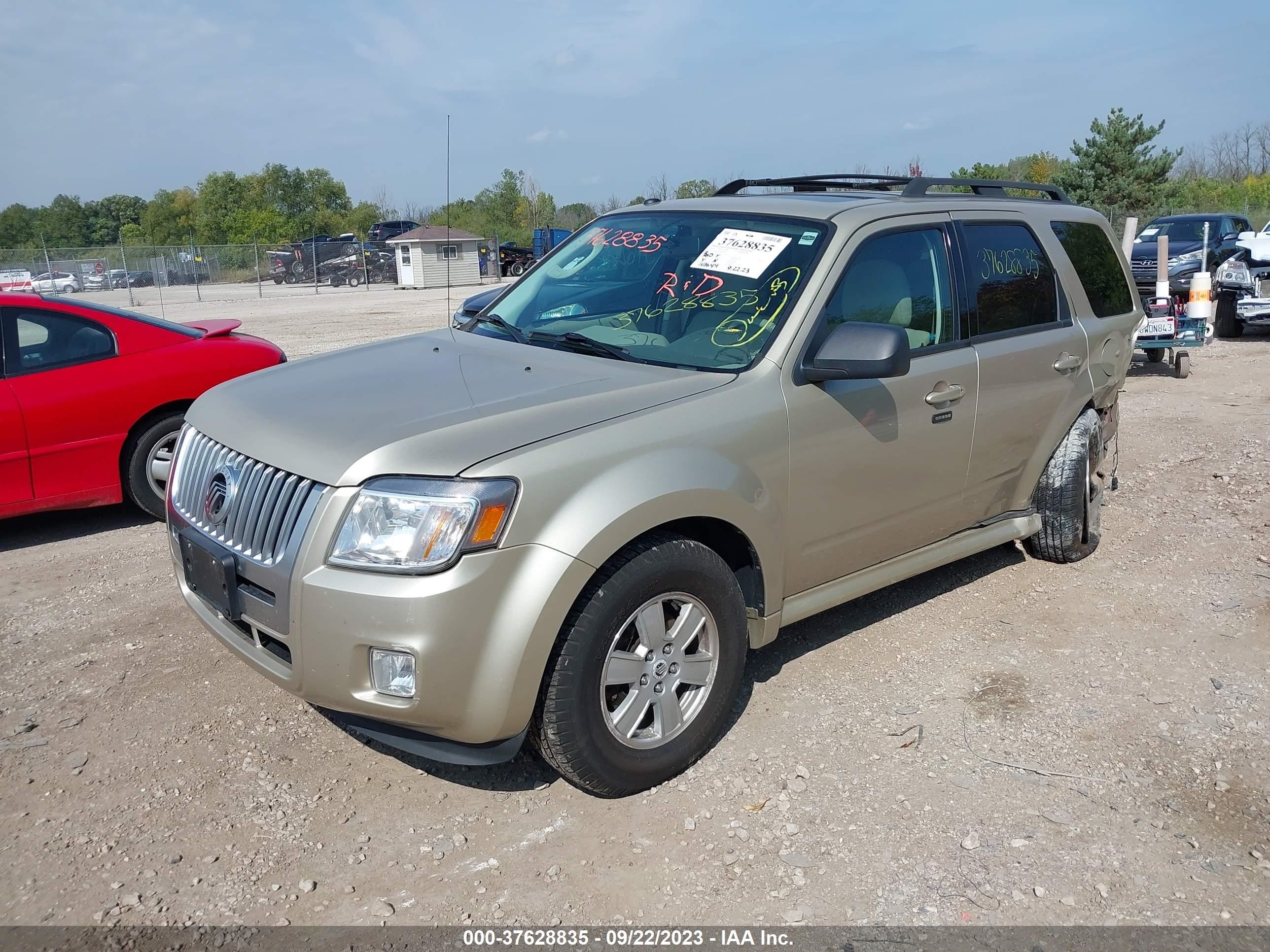 Photo 1 VIN: 4M2CN8B77AKJ14858 - MERCURY MARINER 