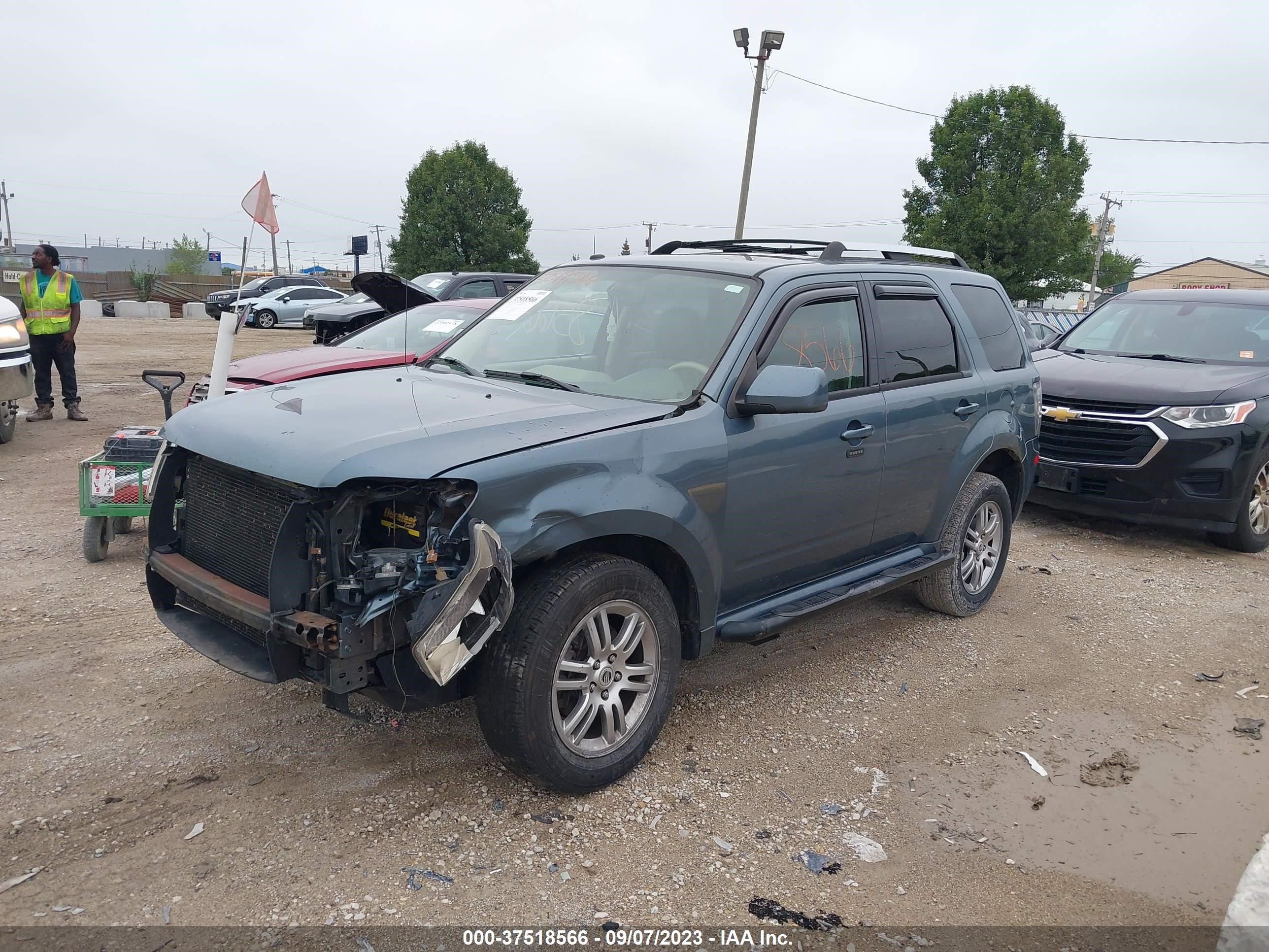 Photo 1 VIN: 4M2CN8H75BKJ00692 - MERCURY MARINER 