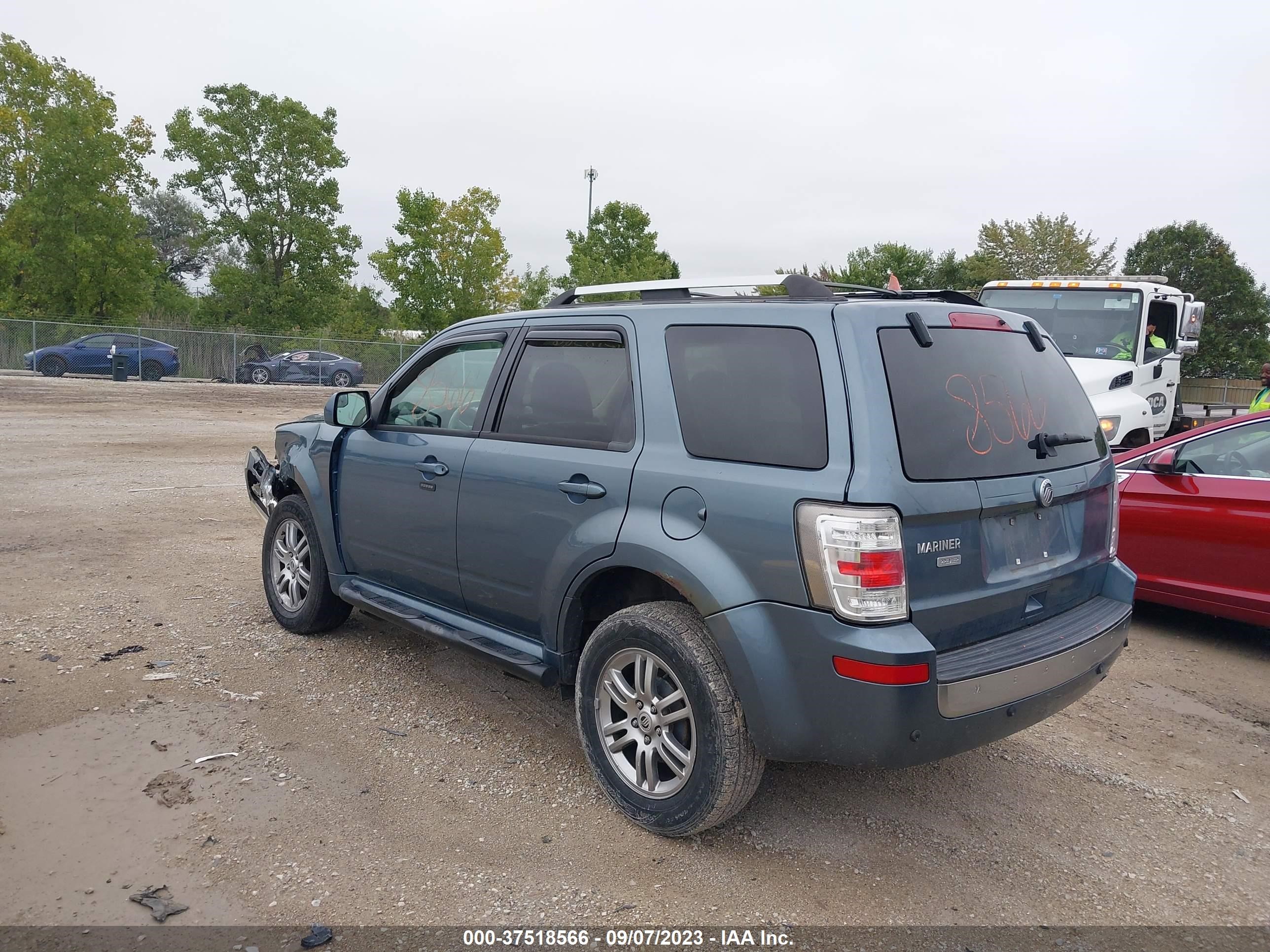 Photo 2 VIN: 4M2CN8H75BKJ00692 - MERCURY MARINER 