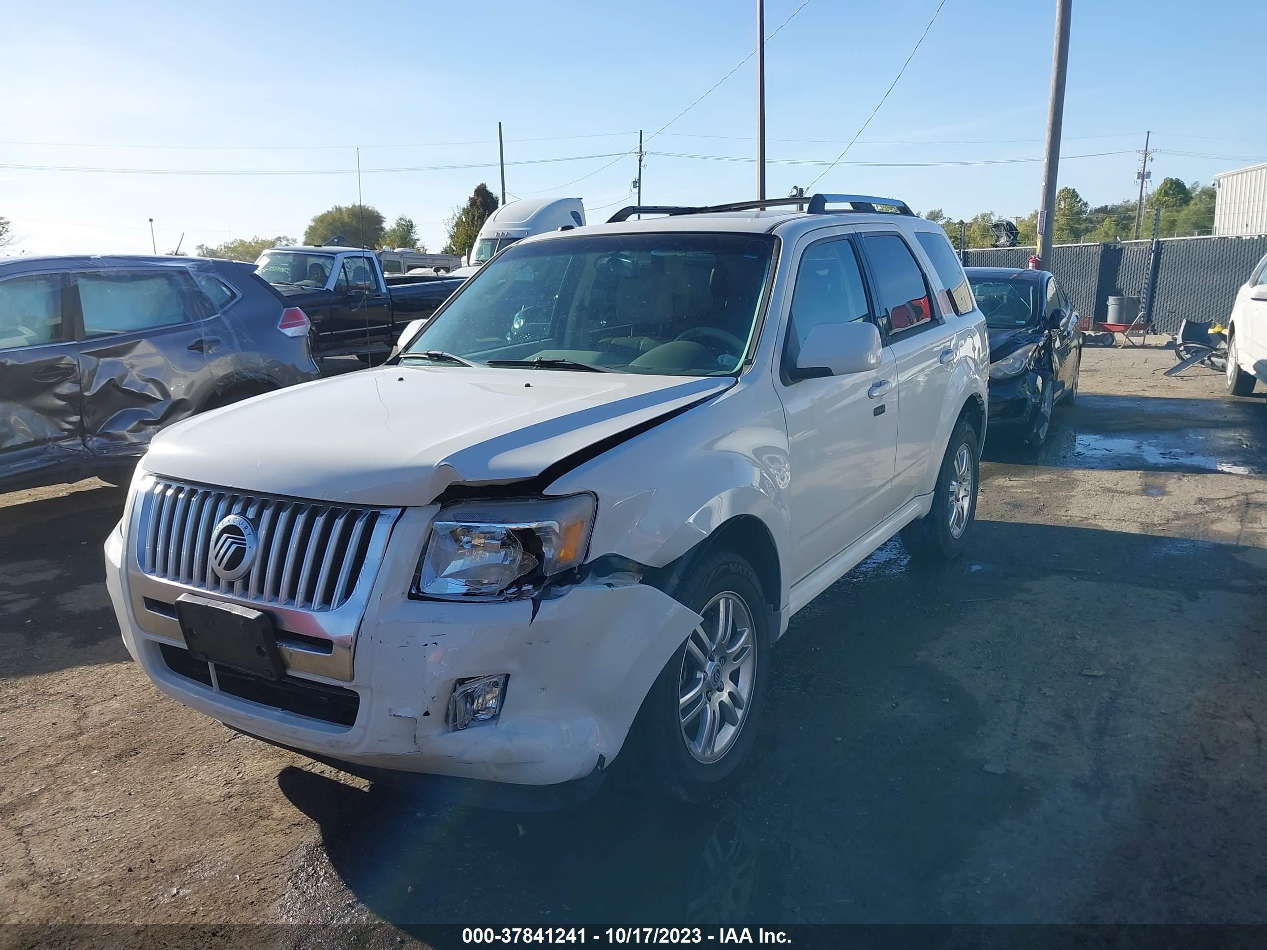 Photo 5 VIN: 4M2CN8H76AKJ30203 - MERCURY MARINER 