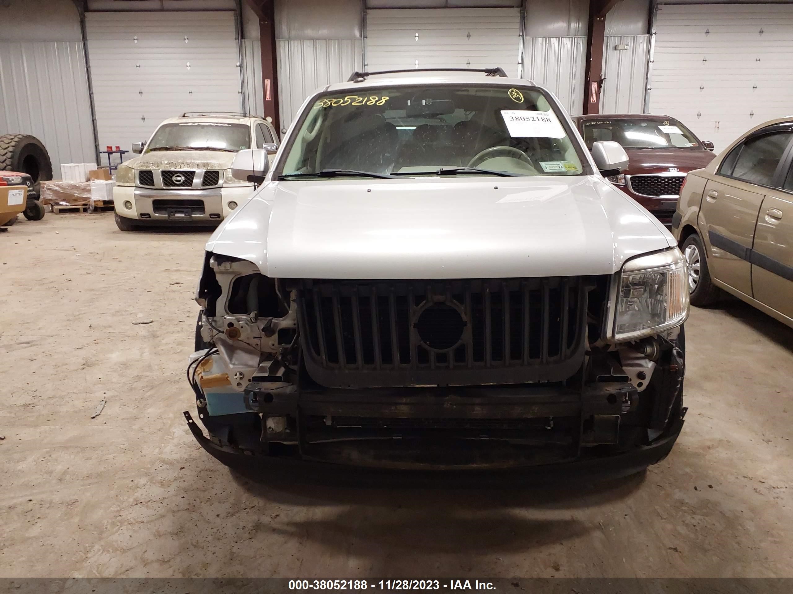 Photo 12 VIN: 4M2CU29369KJ01579 - MERCURY MARINER 