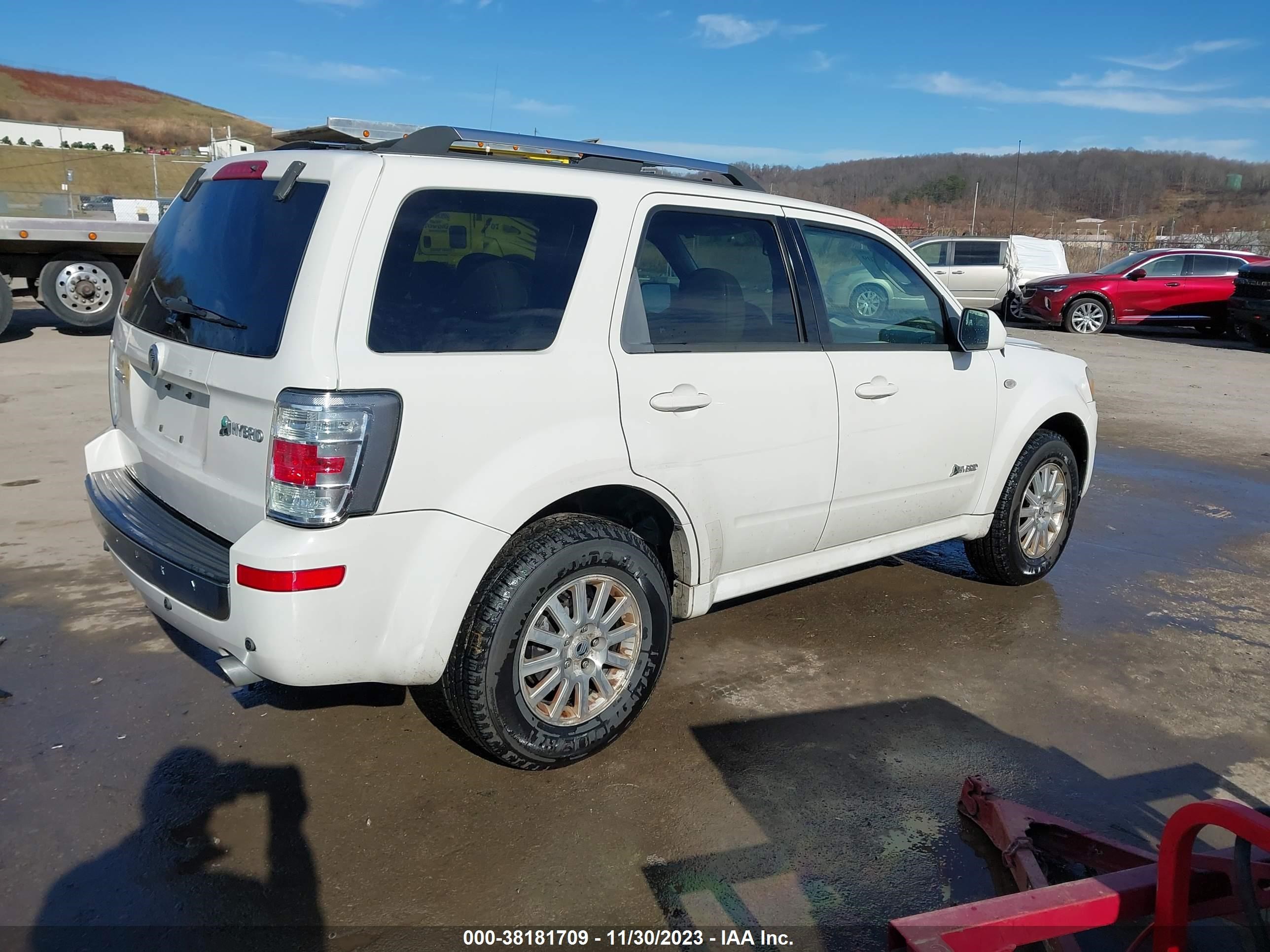 Photo 3 VIN: 4M2CU39339KJ07118 - MERCURY MARINER 