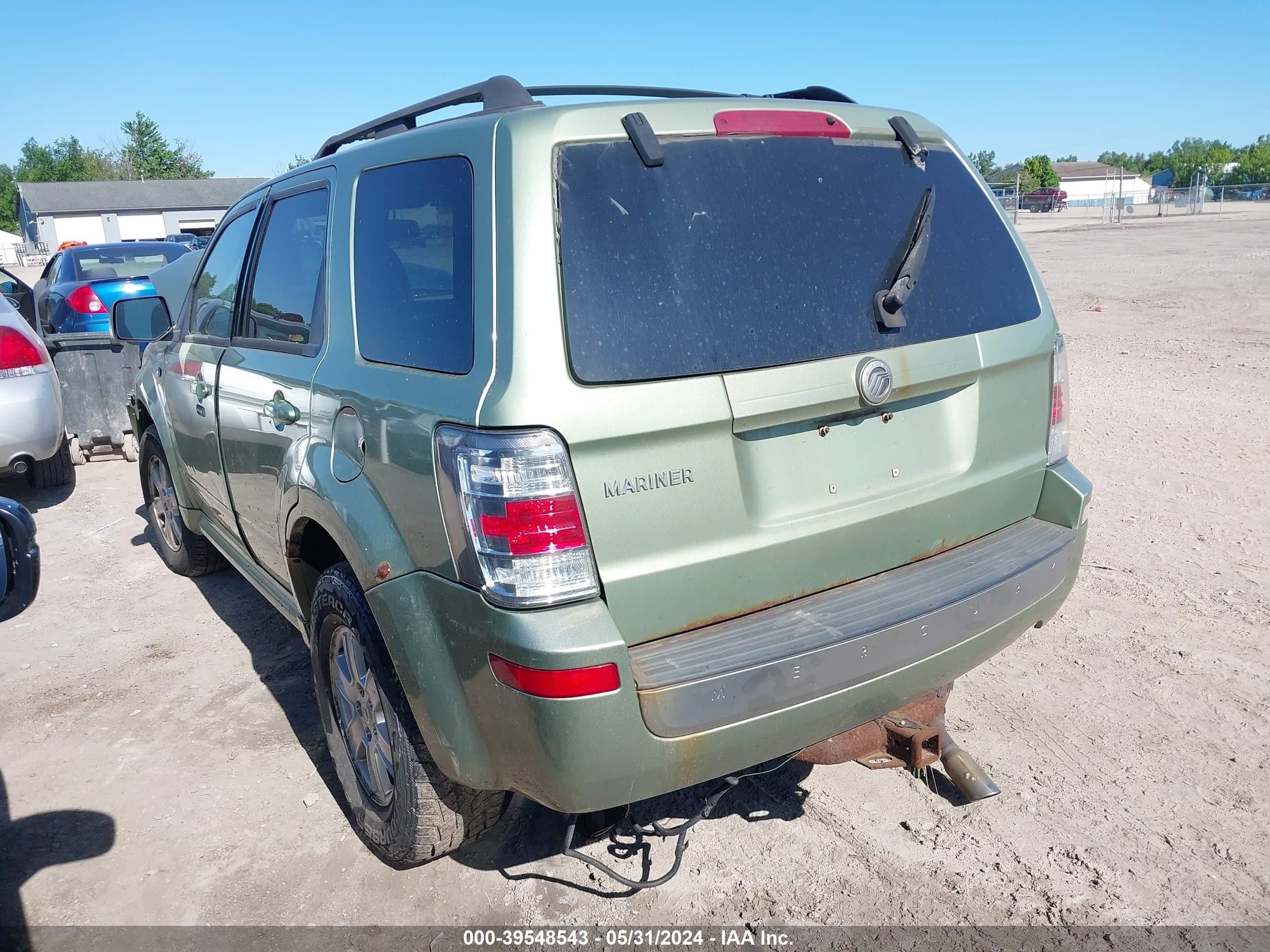 Photo 2 VIN: 4M2CU81G19KJ26634 - MERCURY MARINER 