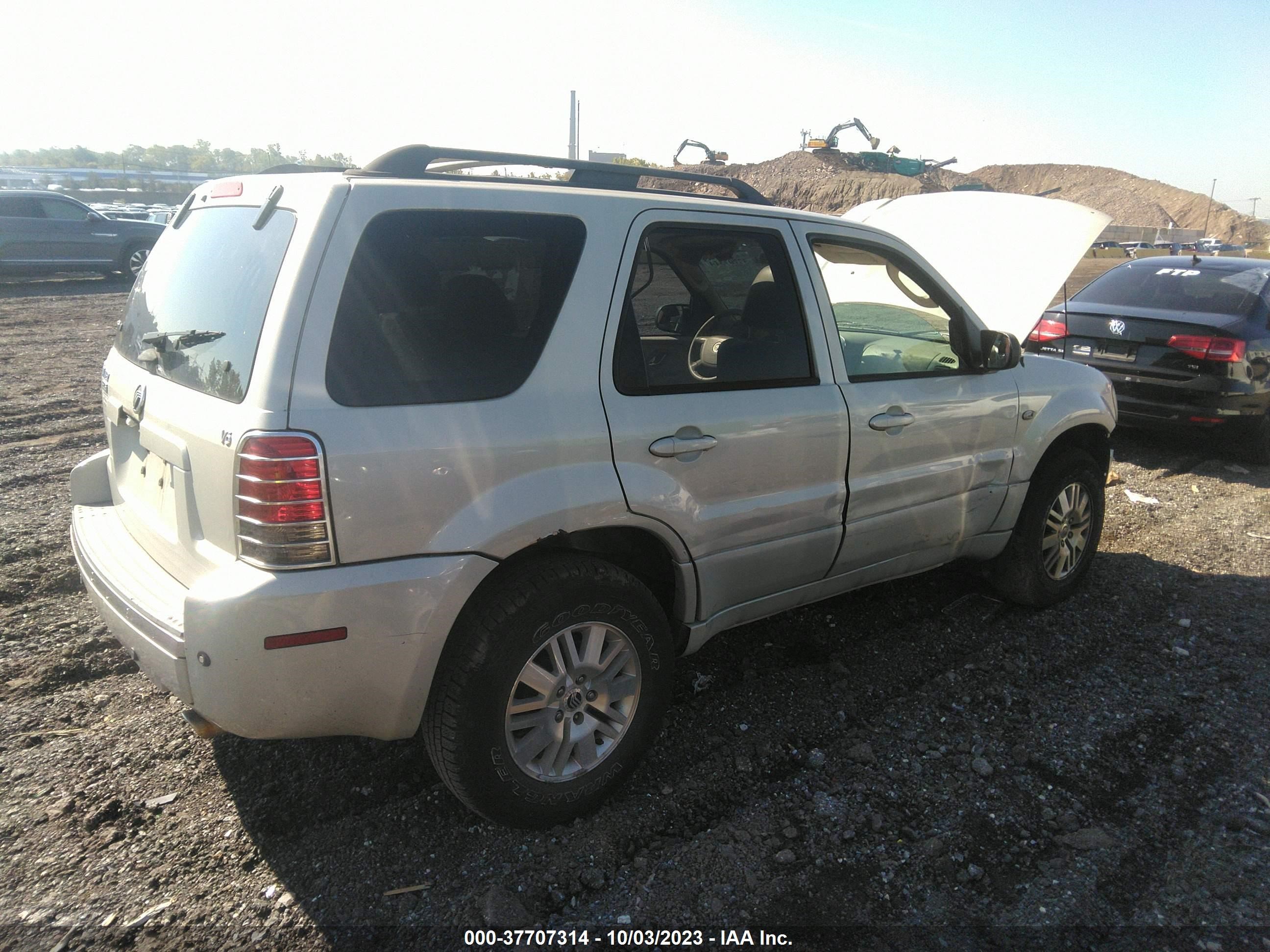 Photo 3 VIN: 4M2CU87167KJ05360 - MERCURY MARINER 