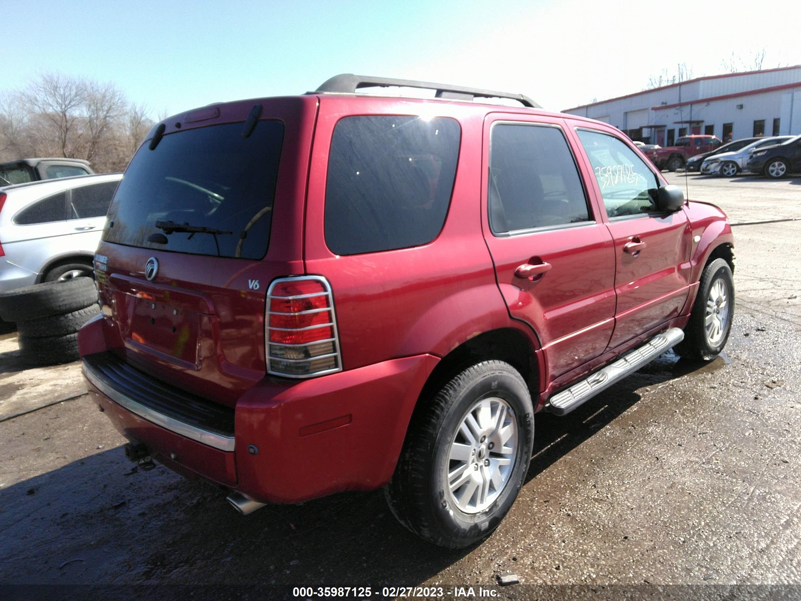 Photo 3 VIN: 4M2CU87197KJ15025 - MERCURY MARINER 