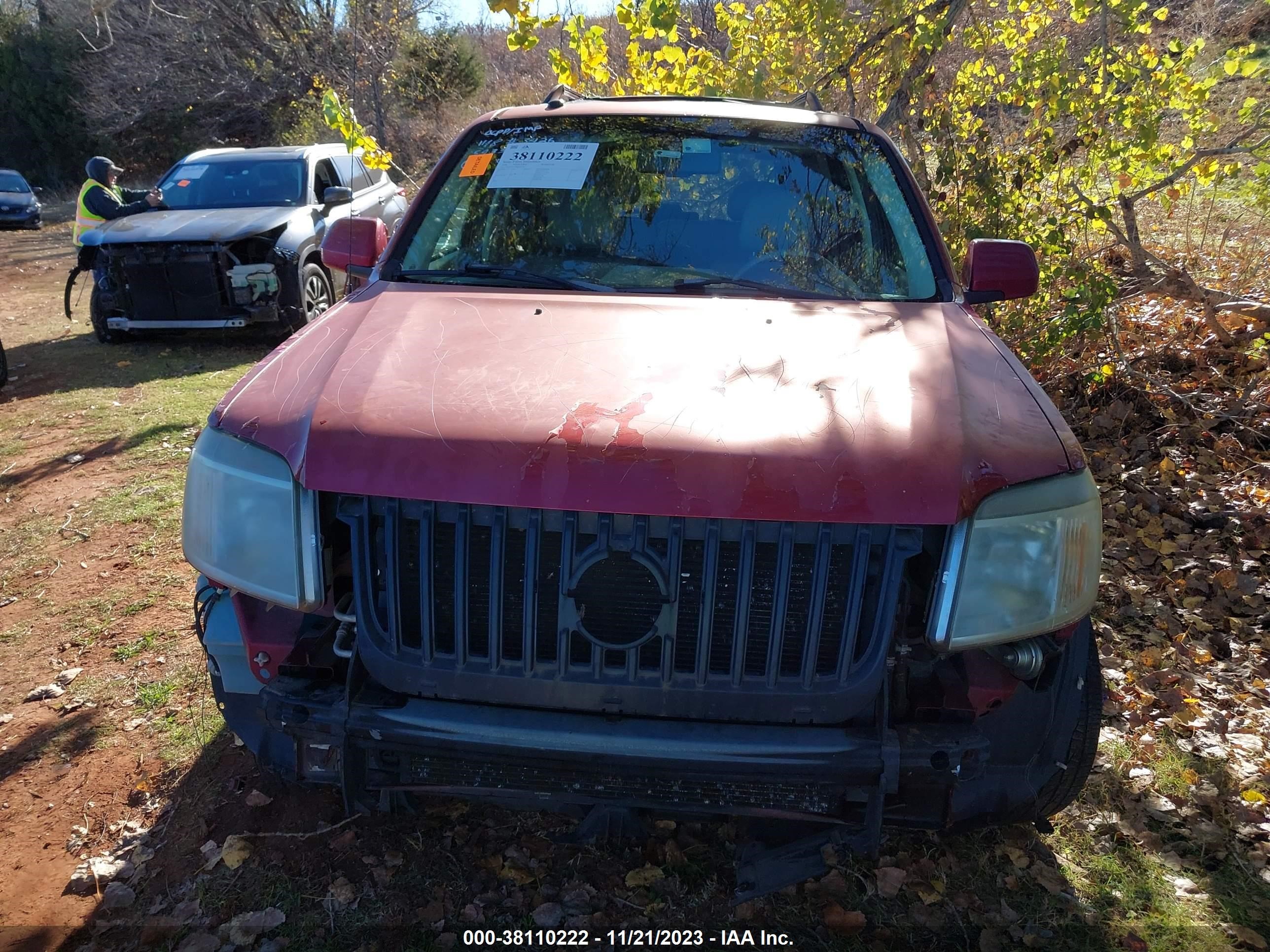 Photo 10 VIN: 4M2CU87198KJ54330 - MERCURY MARINER 