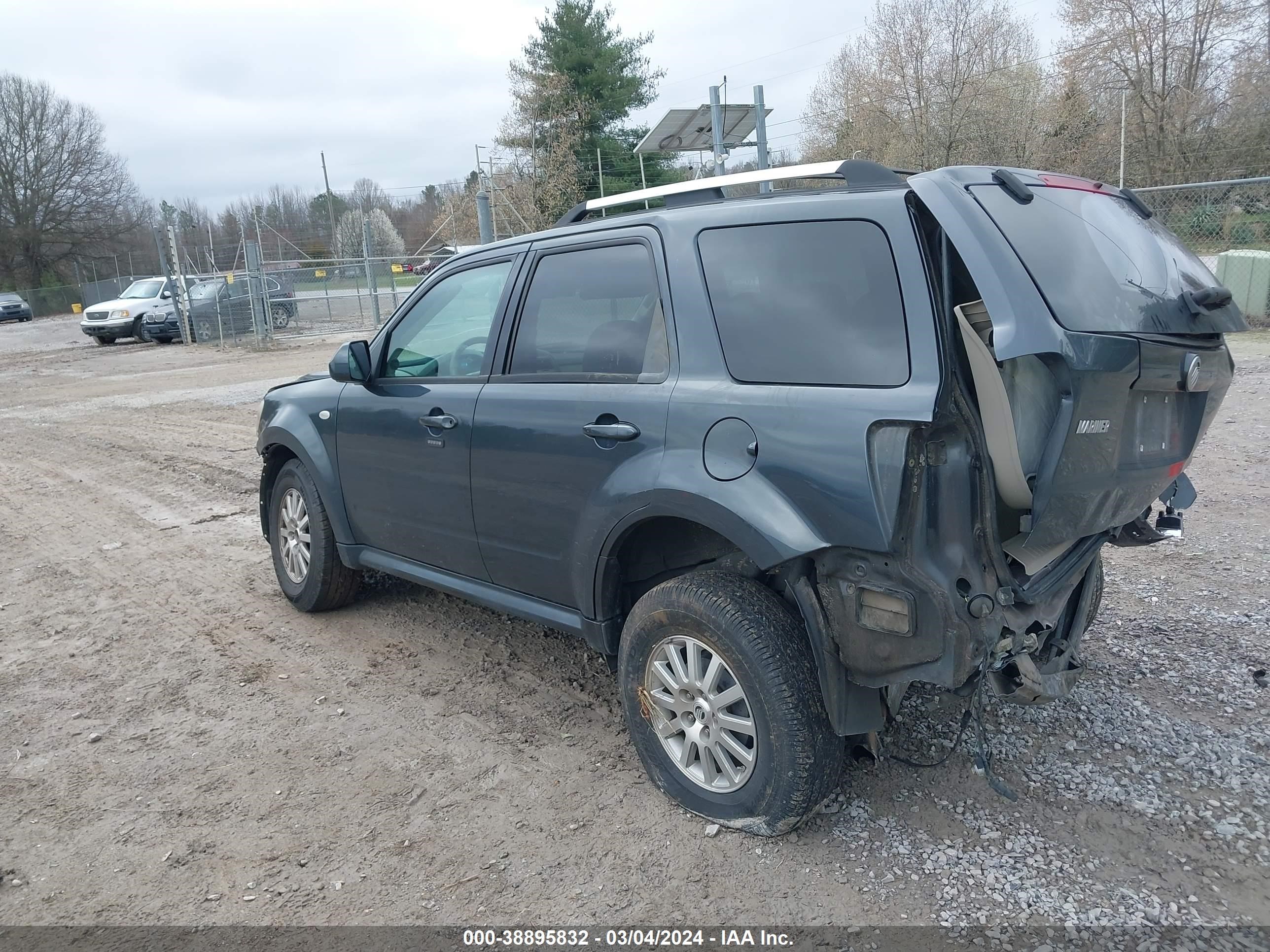 Photo 2 VIN: 4M2CU87759KJ10041 - MERCURY MARINER 