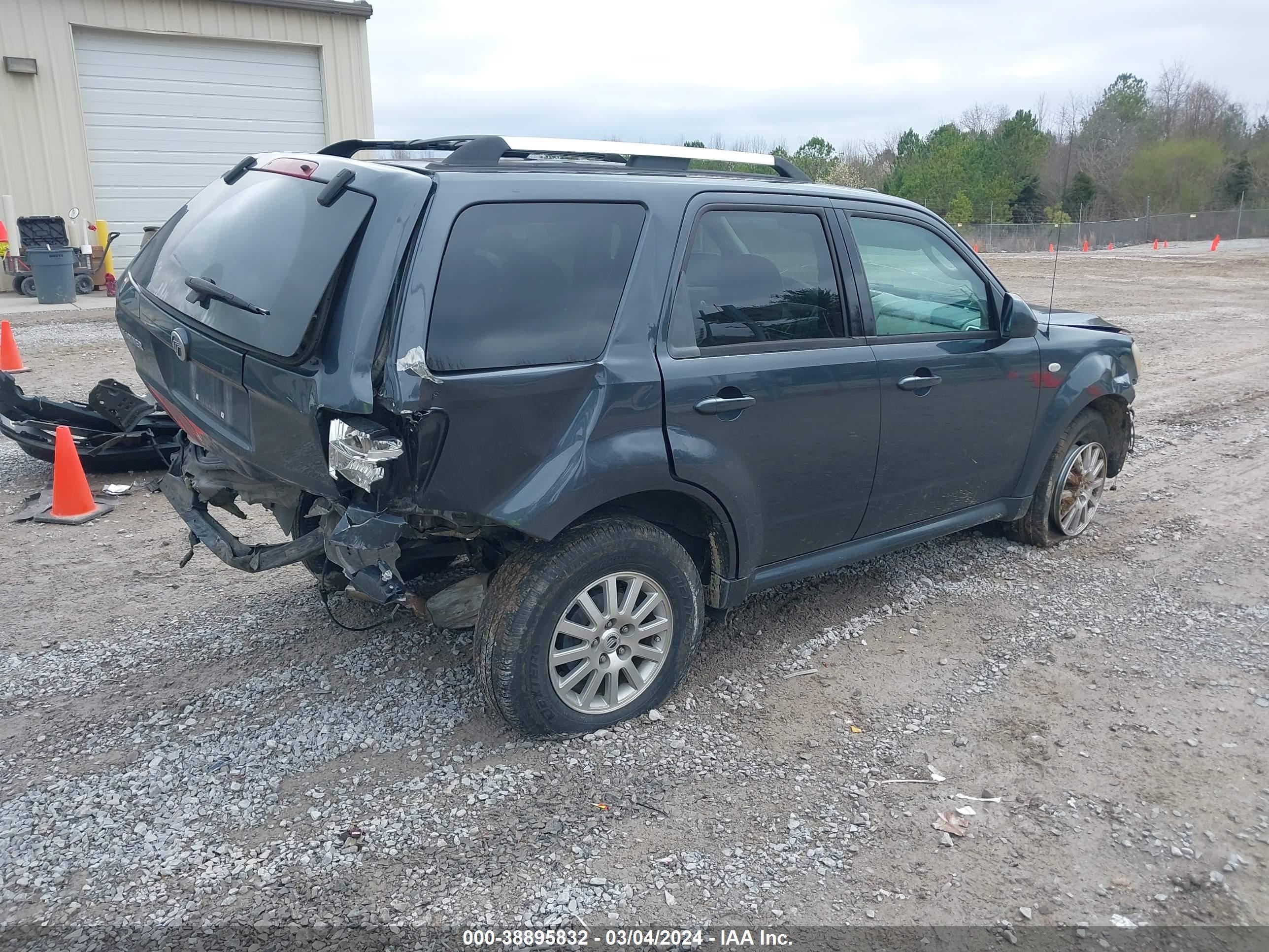 Photo 3 VIN: 4M2CU87759KJ10041 - MERCURY MARINER 