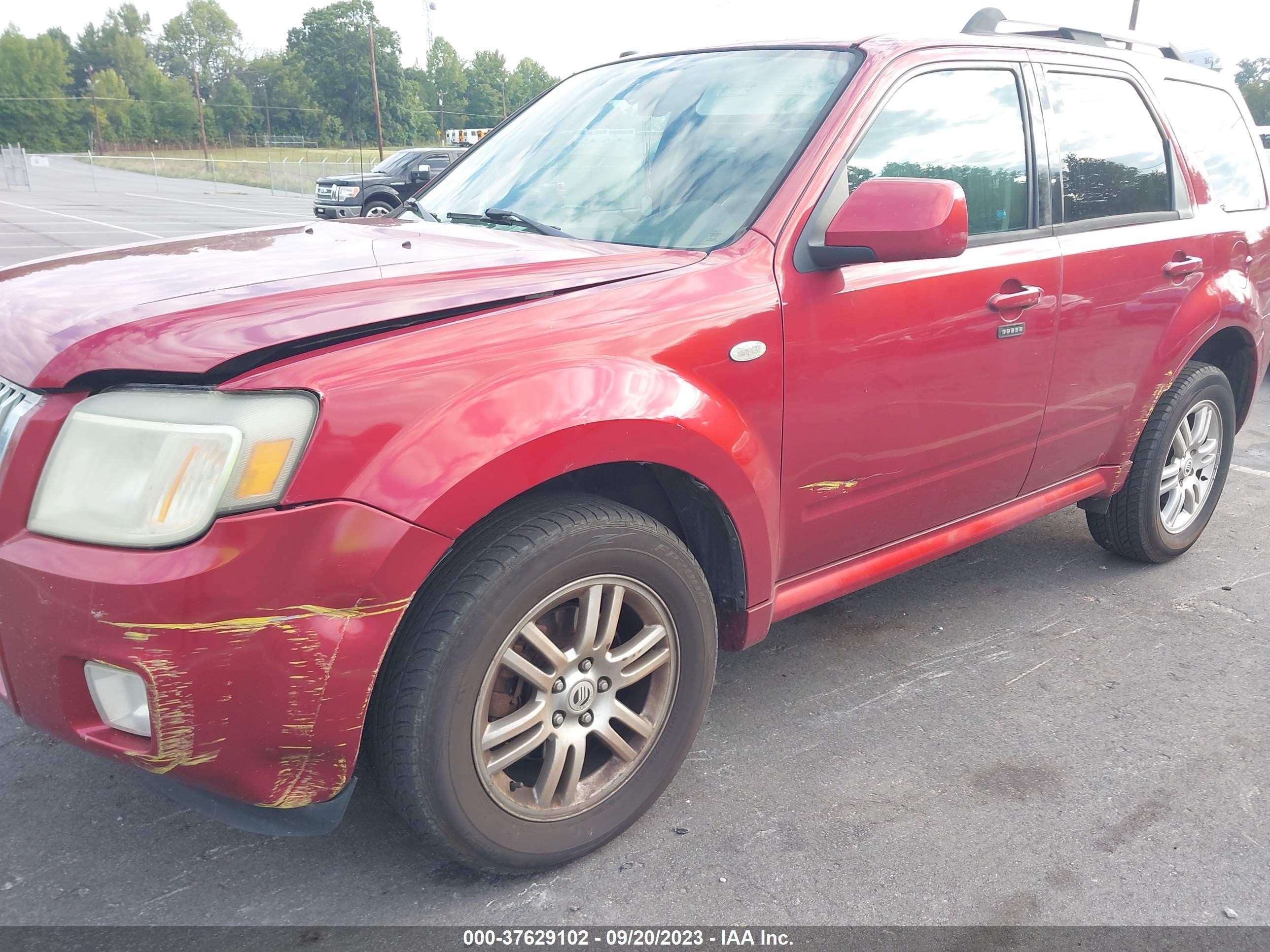 Photo 5 VIN: 4M2CU87G09KJ09573 - MERCURY MARINER 