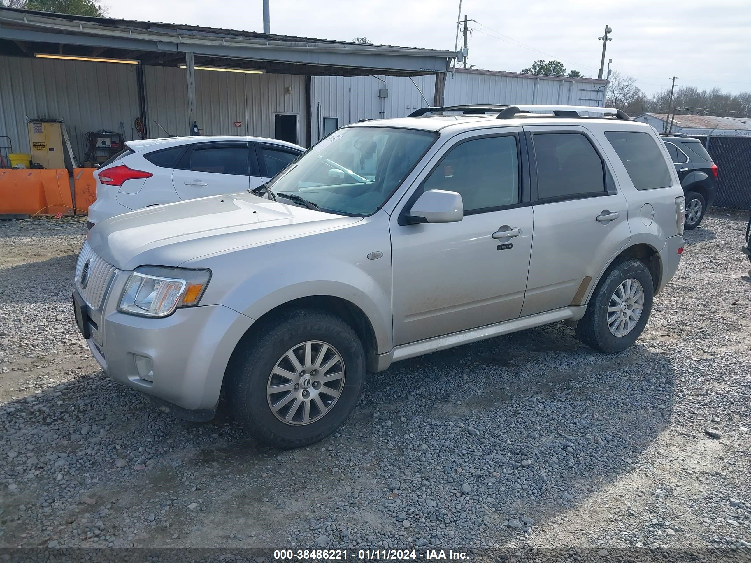 Photo 1 VIN: 4M2CU87G29KJ20543 - MERCURY MARINER 