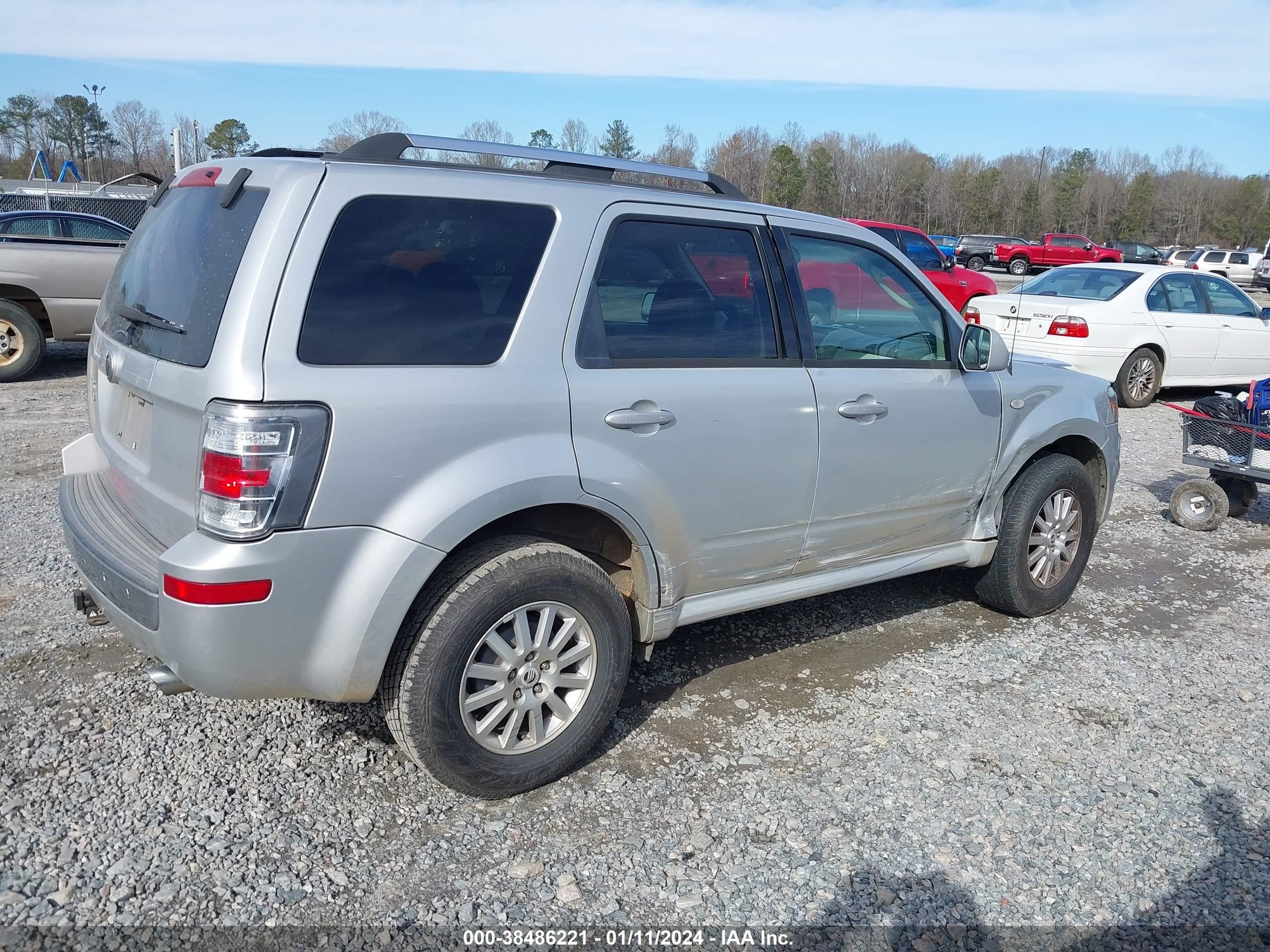 Photo 3 VIN: 4M2CU87G29KJ20543 - MERCURY MARINER 