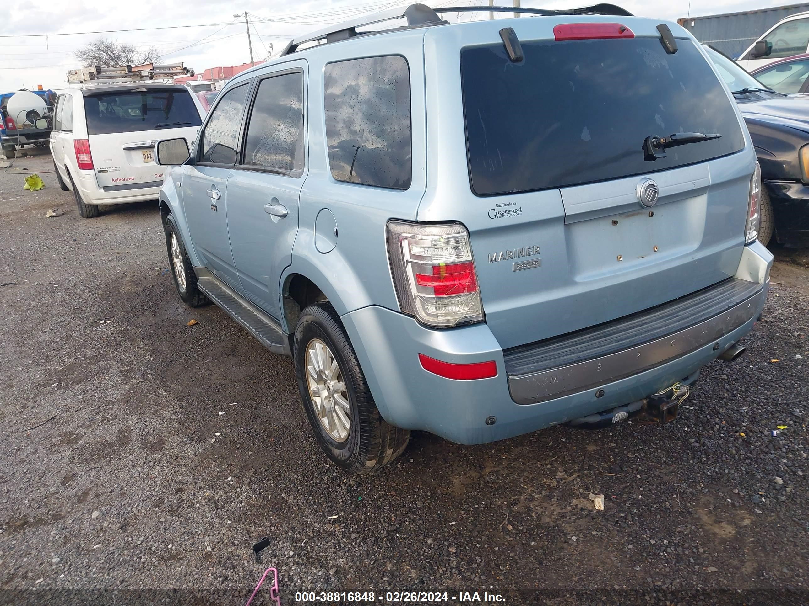 Photo 2 VIN: 4M2CU87G49KJ07342 - MERCURY MARINER 