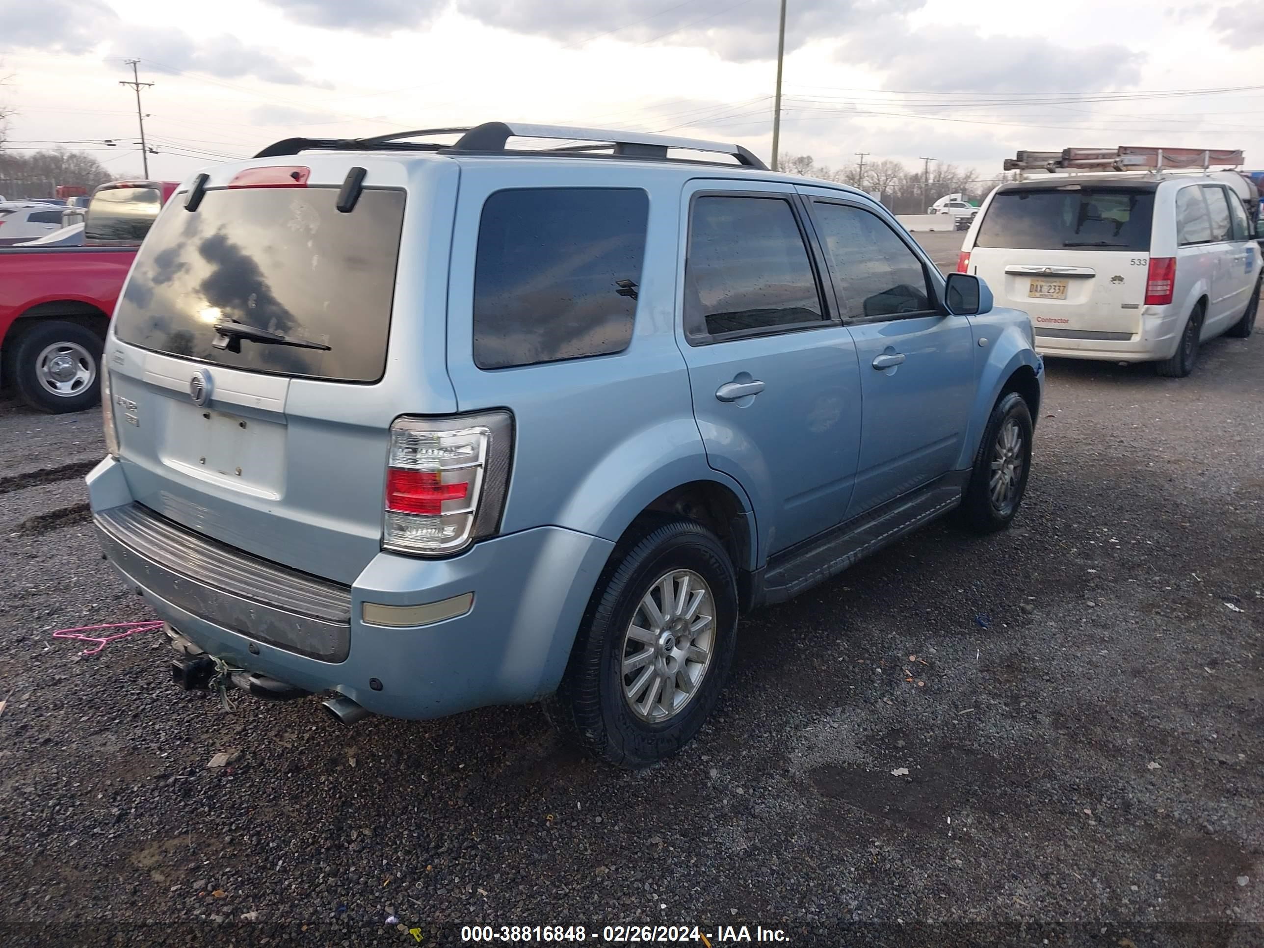 Photo 3 VIN: 4M2CU87G49KJ07342 - MERCURY MARINER 