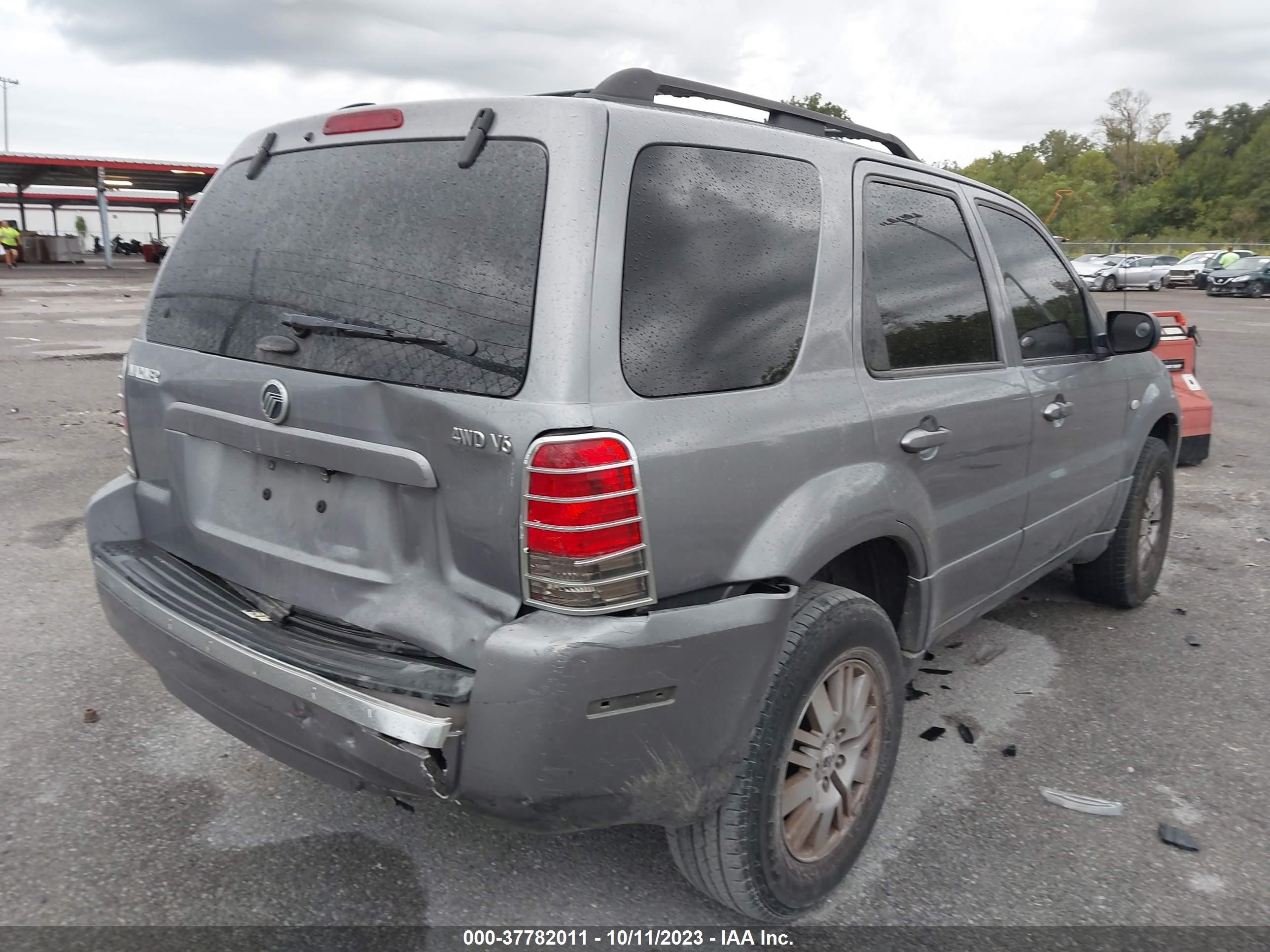 Photo 3 VIN: 4M2CU91197KJ17839 - MERCURY MARINER 