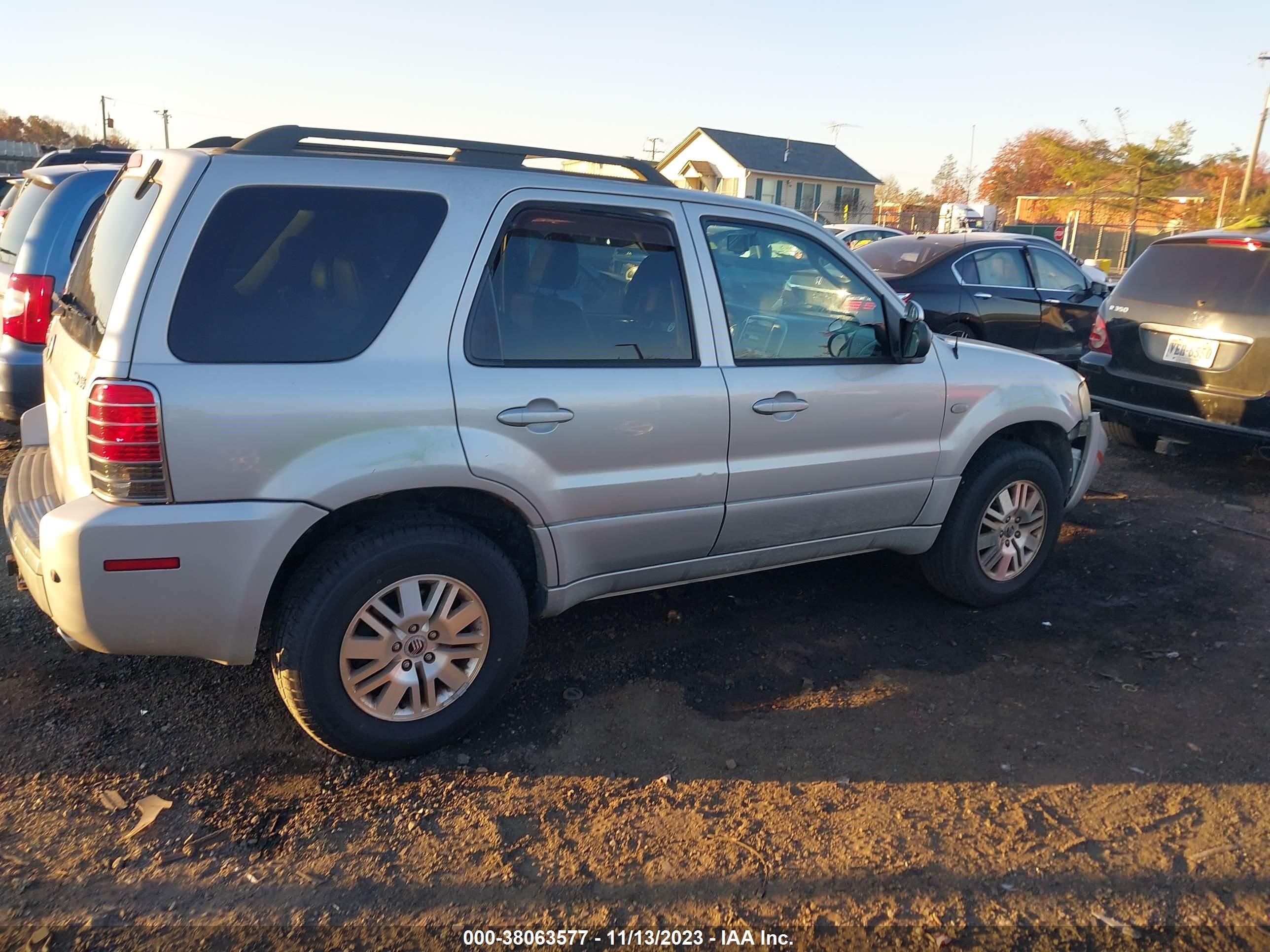 Photo 12 VIN: 4M2CU97147KJ05685 - MERCURY MARINER 